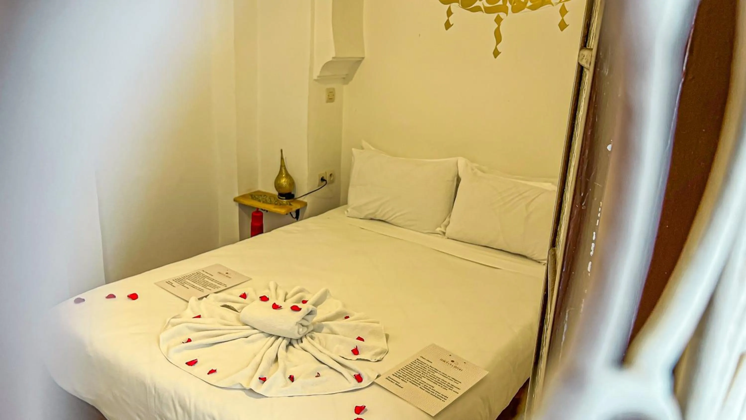 Bedroom, Bed in Riad Tzizwit Boutique Hotel & SPA