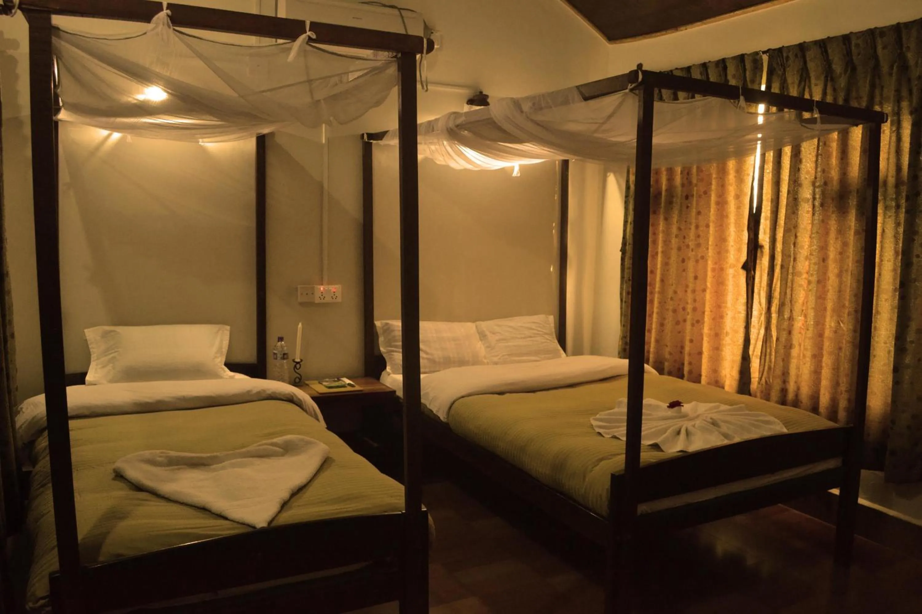 Bed in River View Jungle Camp