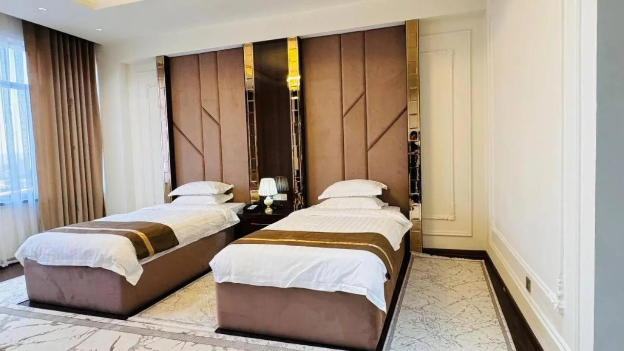 Bed in KANGURT Grand Hotel