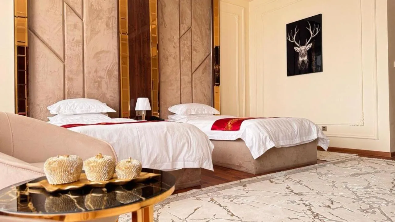 Bed in KANGURT Grand Hotel