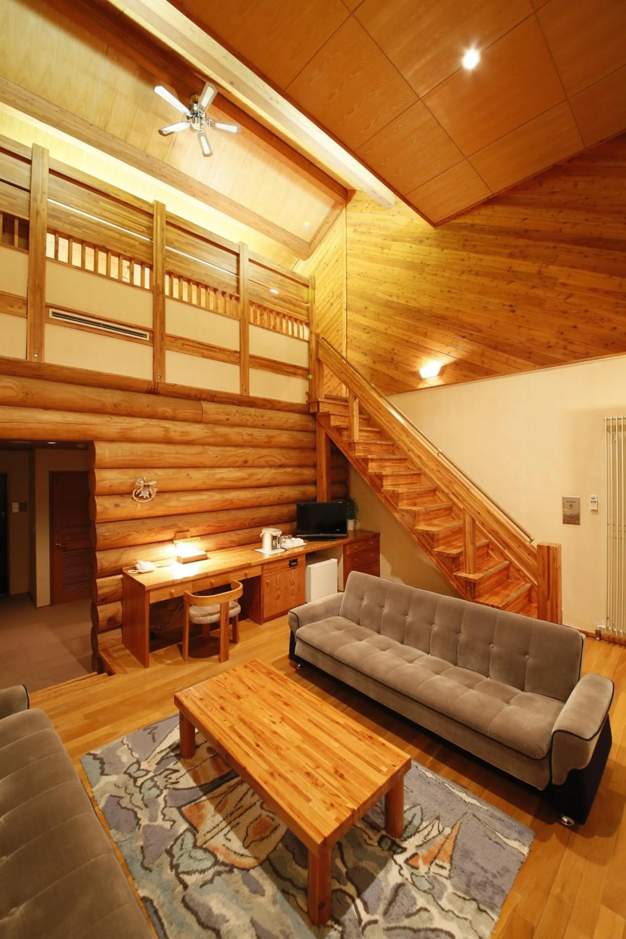 Living room in Log Hotel Larch Lake Kanayama