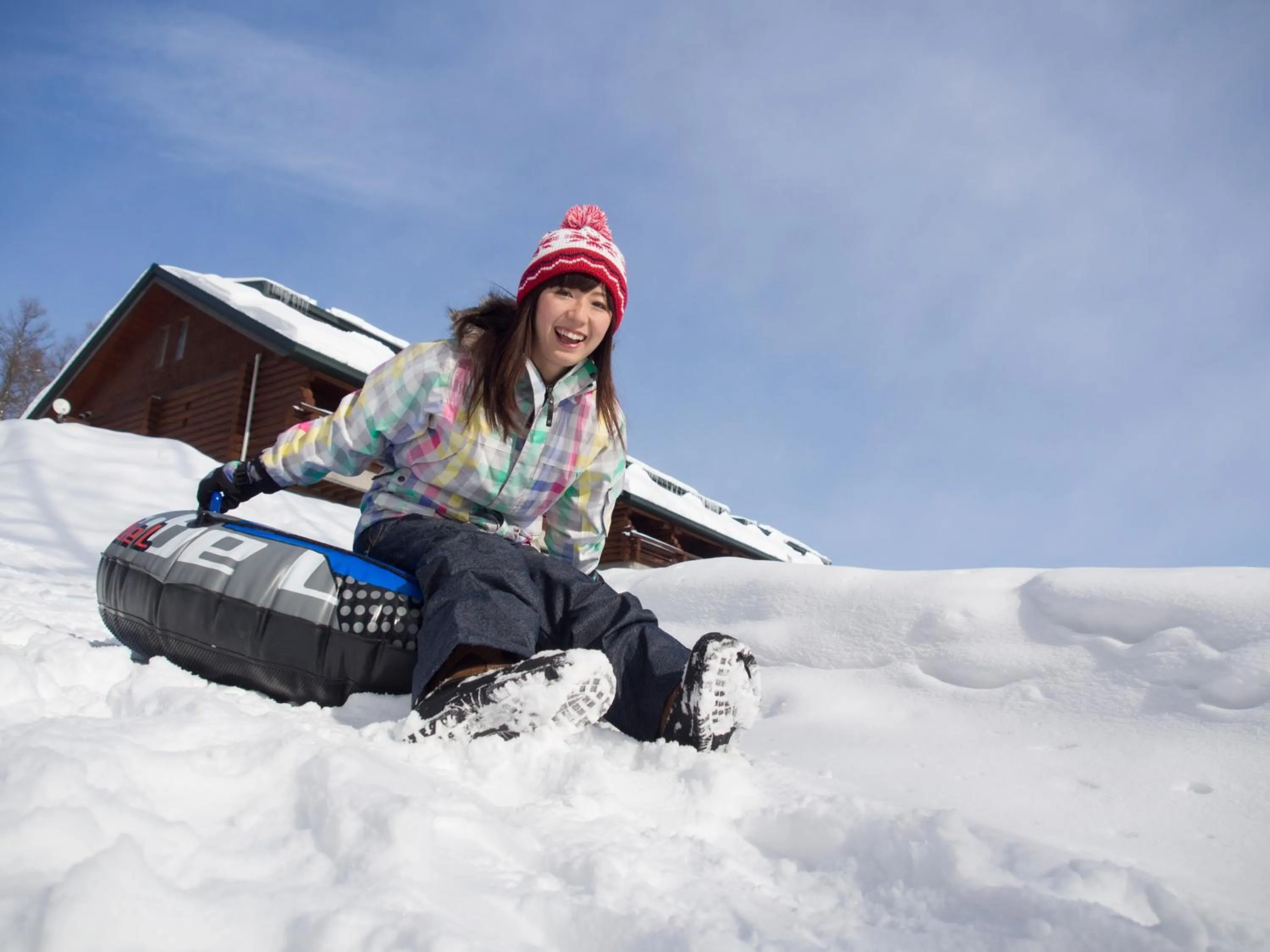 People in Log Hotel Larch Lake Kanayama