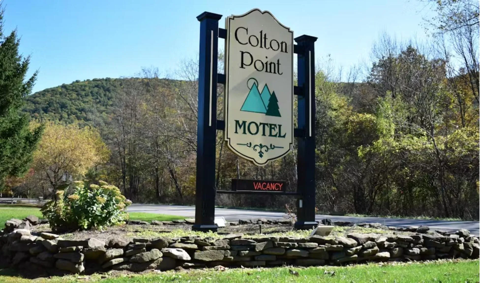 Property logo or sign in Colton Point Motel