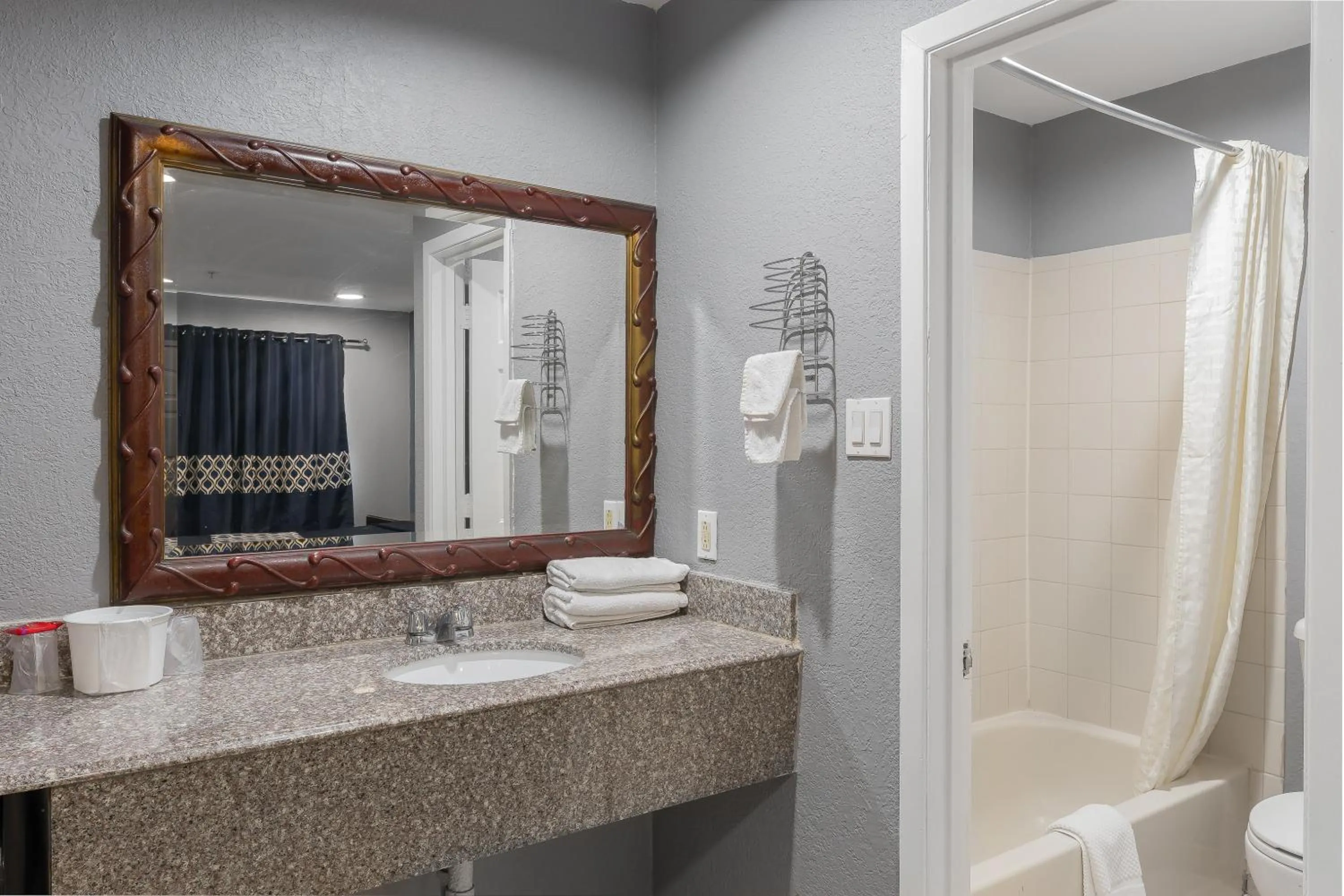 Bathroom in Golden Inn Dallas by Hotel O