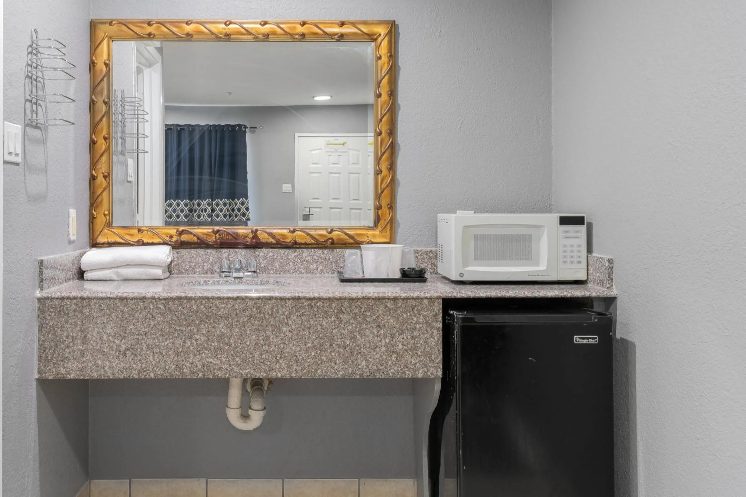 Bathroom in Golden Inn Dallas by Hotel O