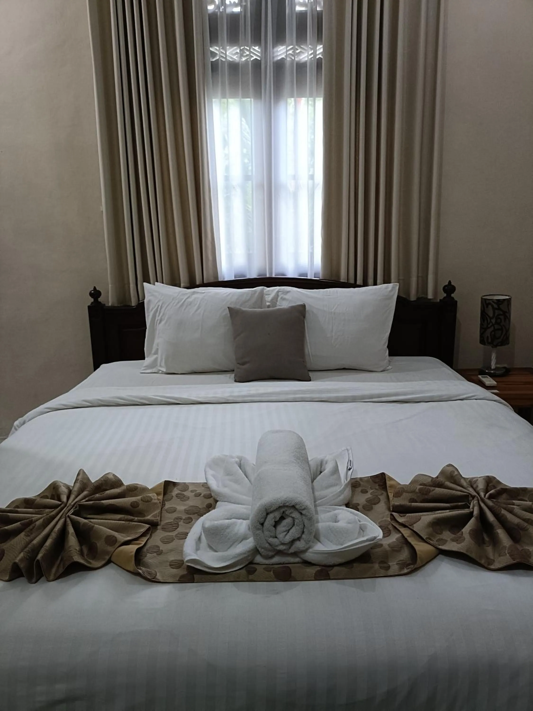 Bed in Ngetis Home Stay