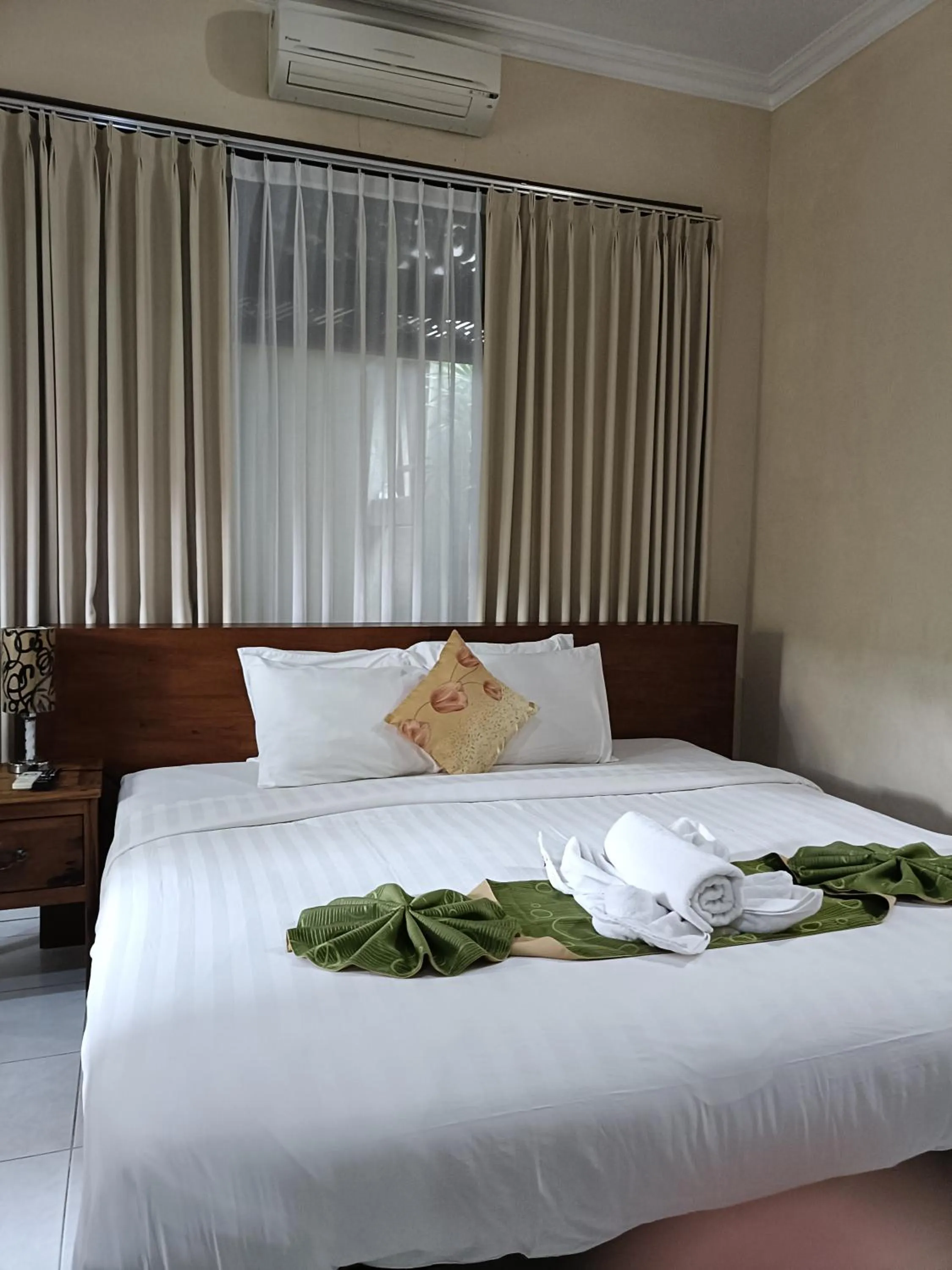 Bed in Ngetis Home Stay