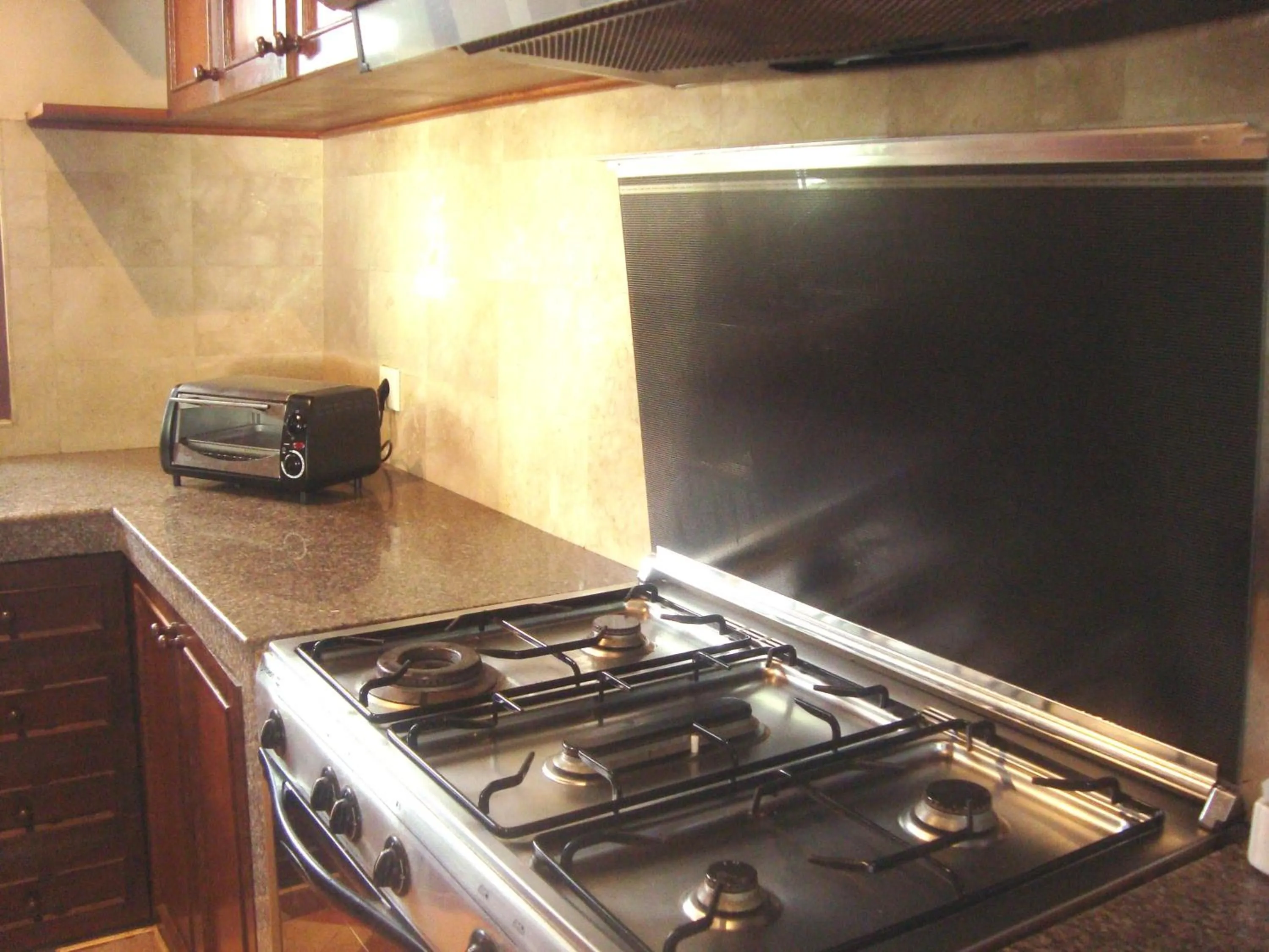 Communal kitchen in Ngetis Home Stay