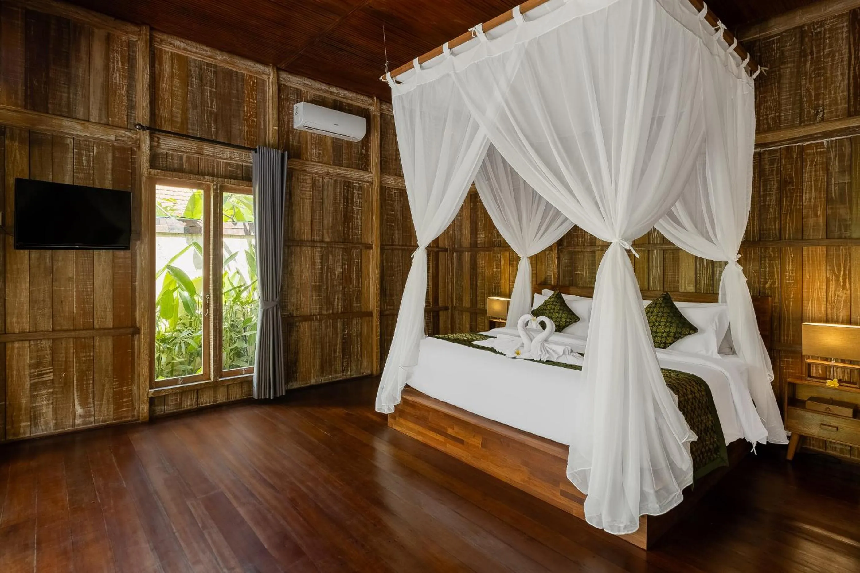 Bed in The Ulon Ubud Villa