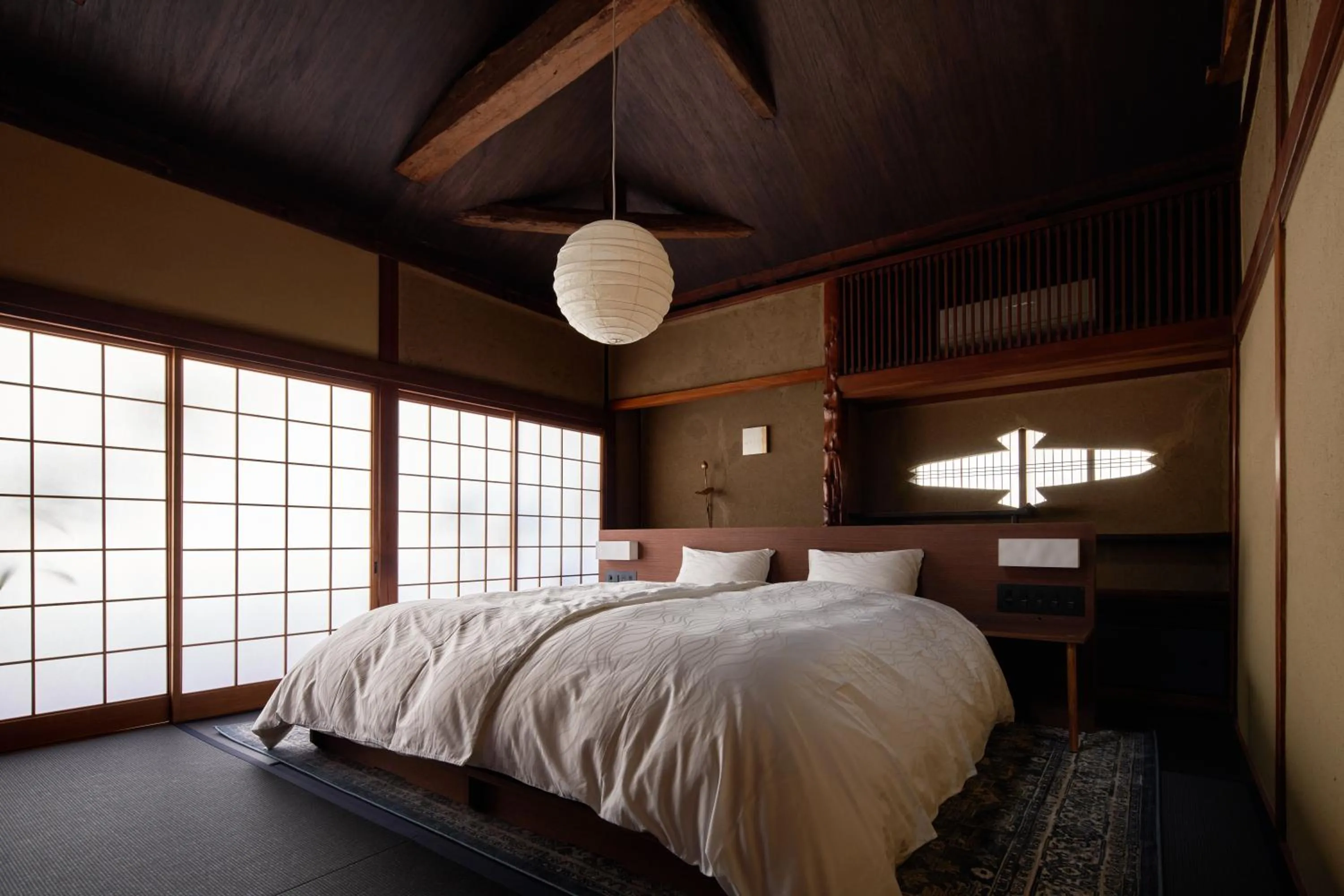 Bed in 城崎温泉 旅館 つばき乃 - Kinosaki Onsen Ryokan Tsubakino