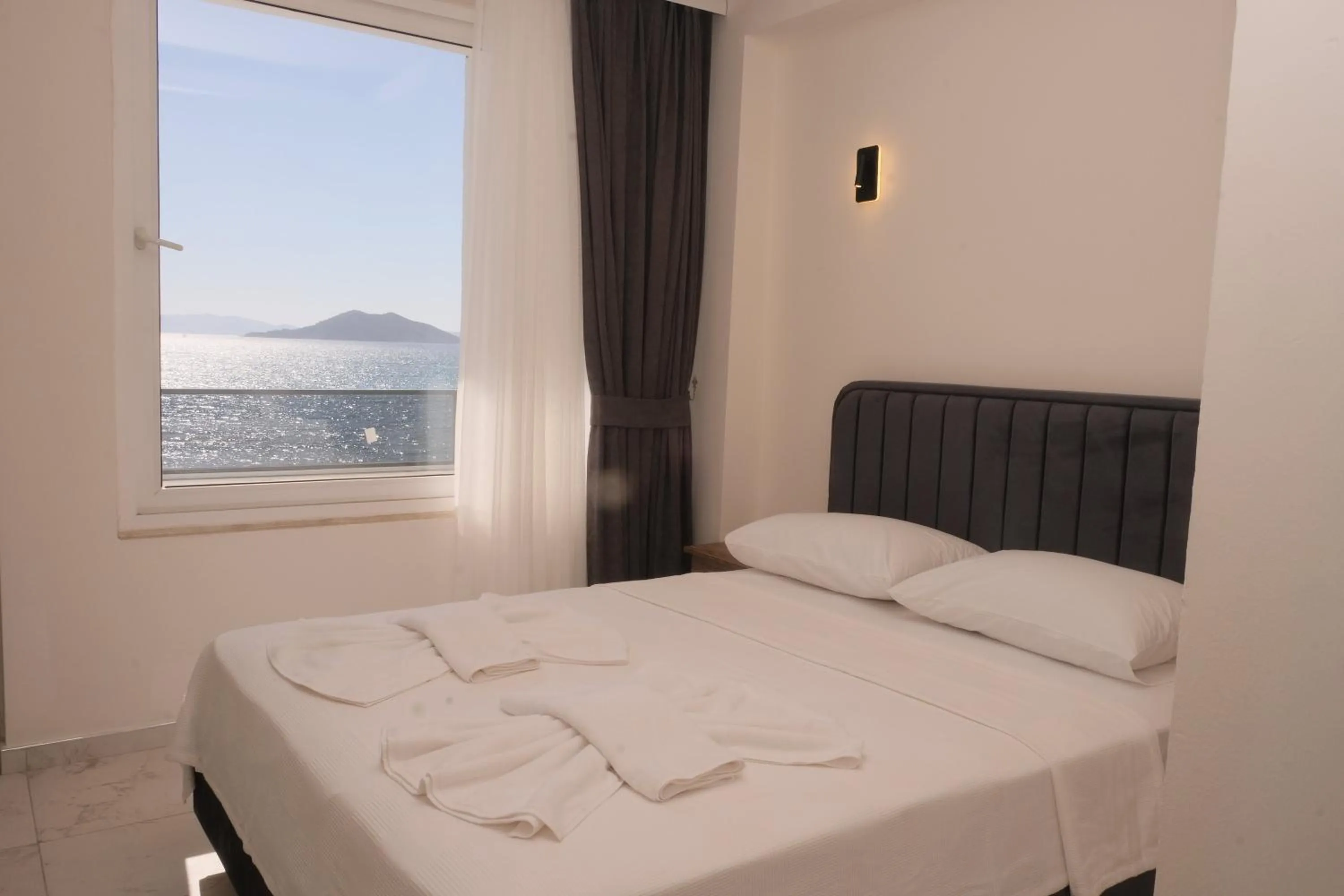 Bed in Sea Door Hotel