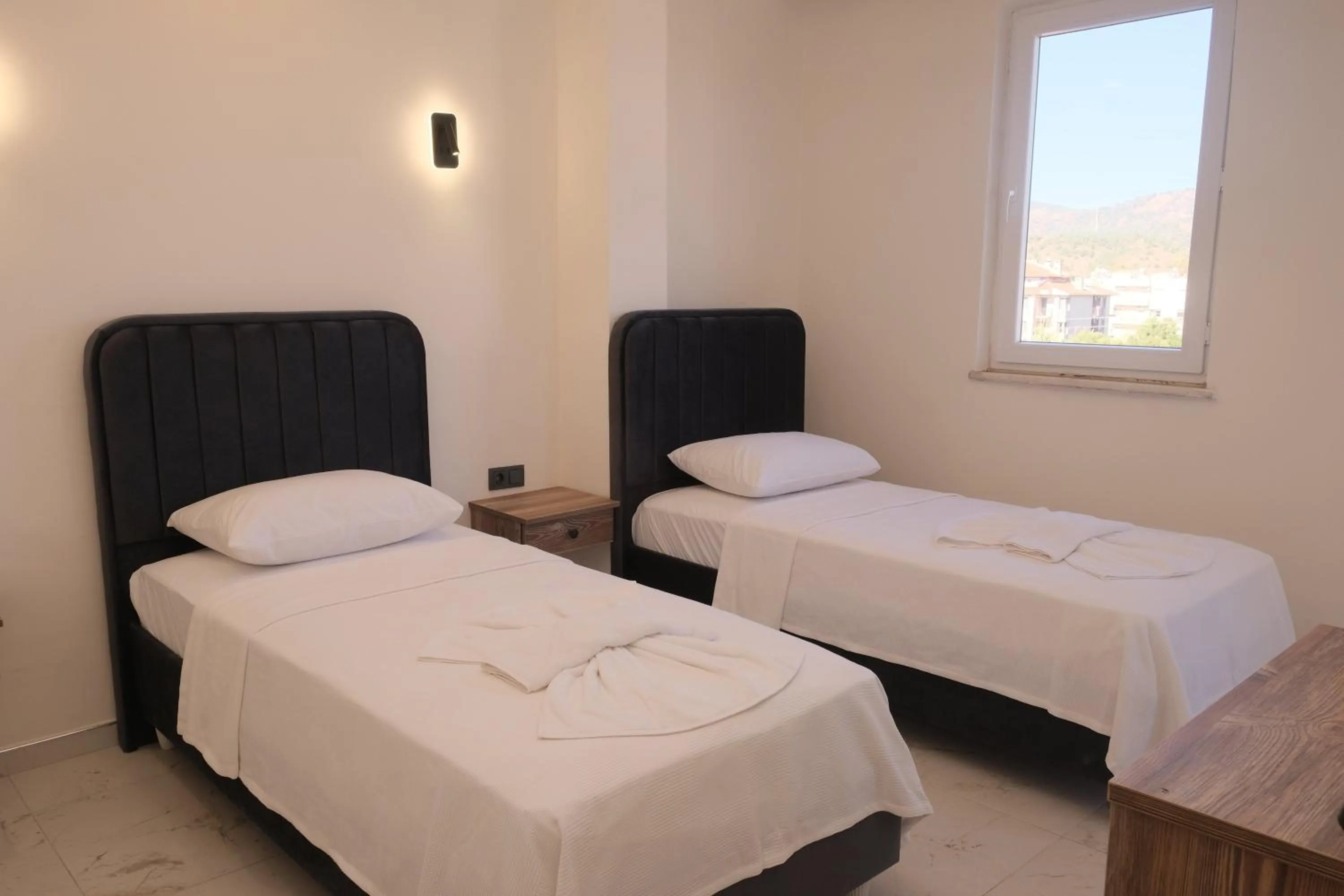 Bed in Sea Door Hotel