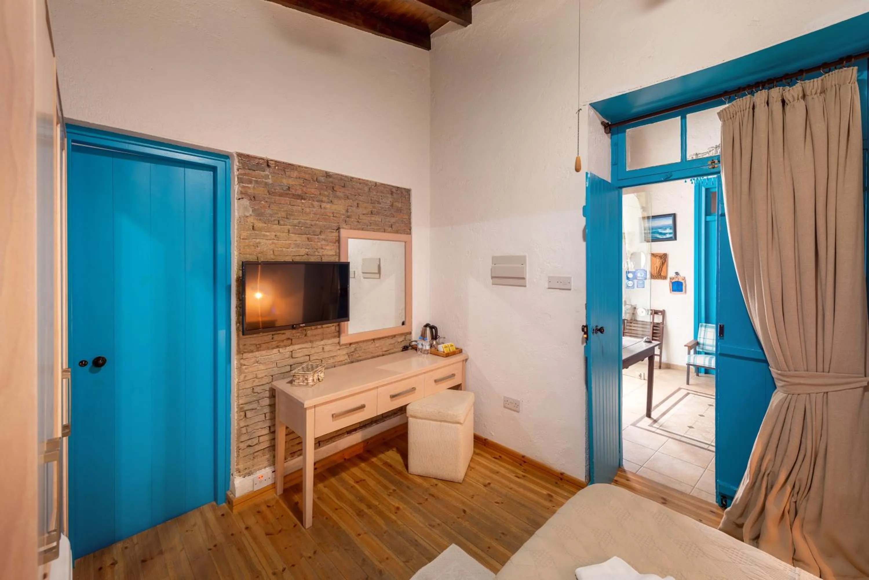 Bed in Cypriot Swallow Boutique Hotel