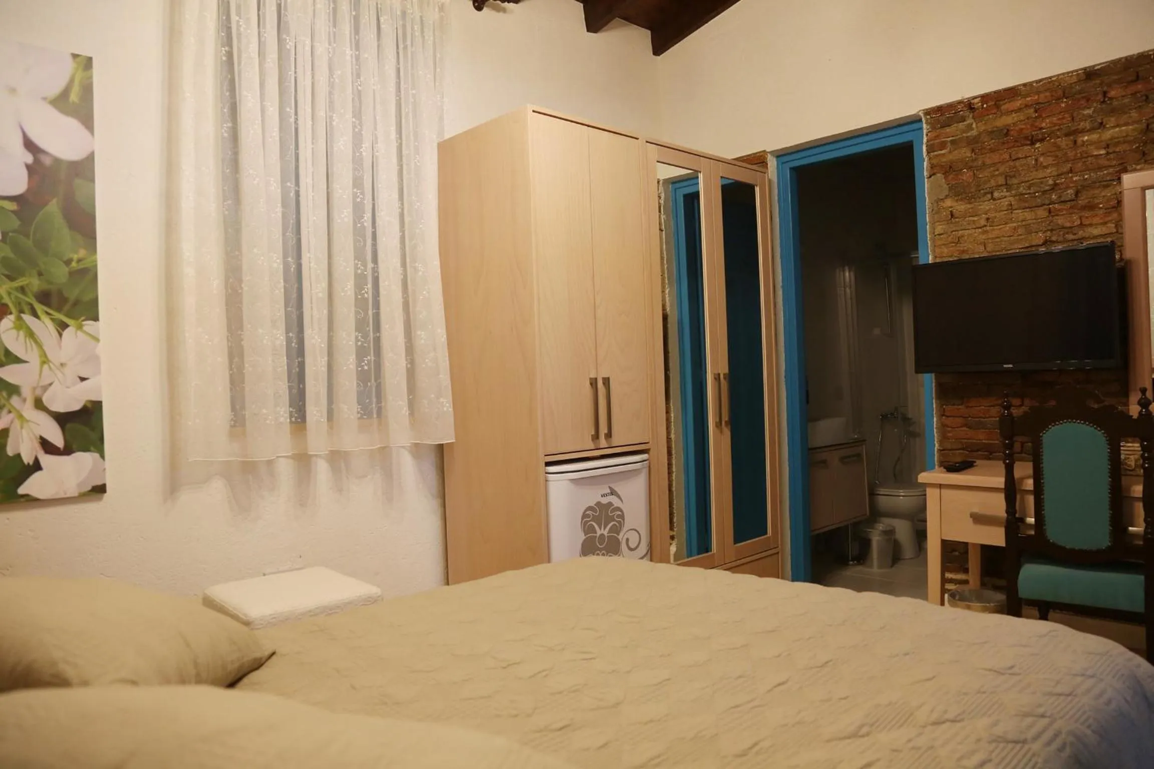 Photo of the whole room, Bed in Cypriot Swallow Boutique Hotel