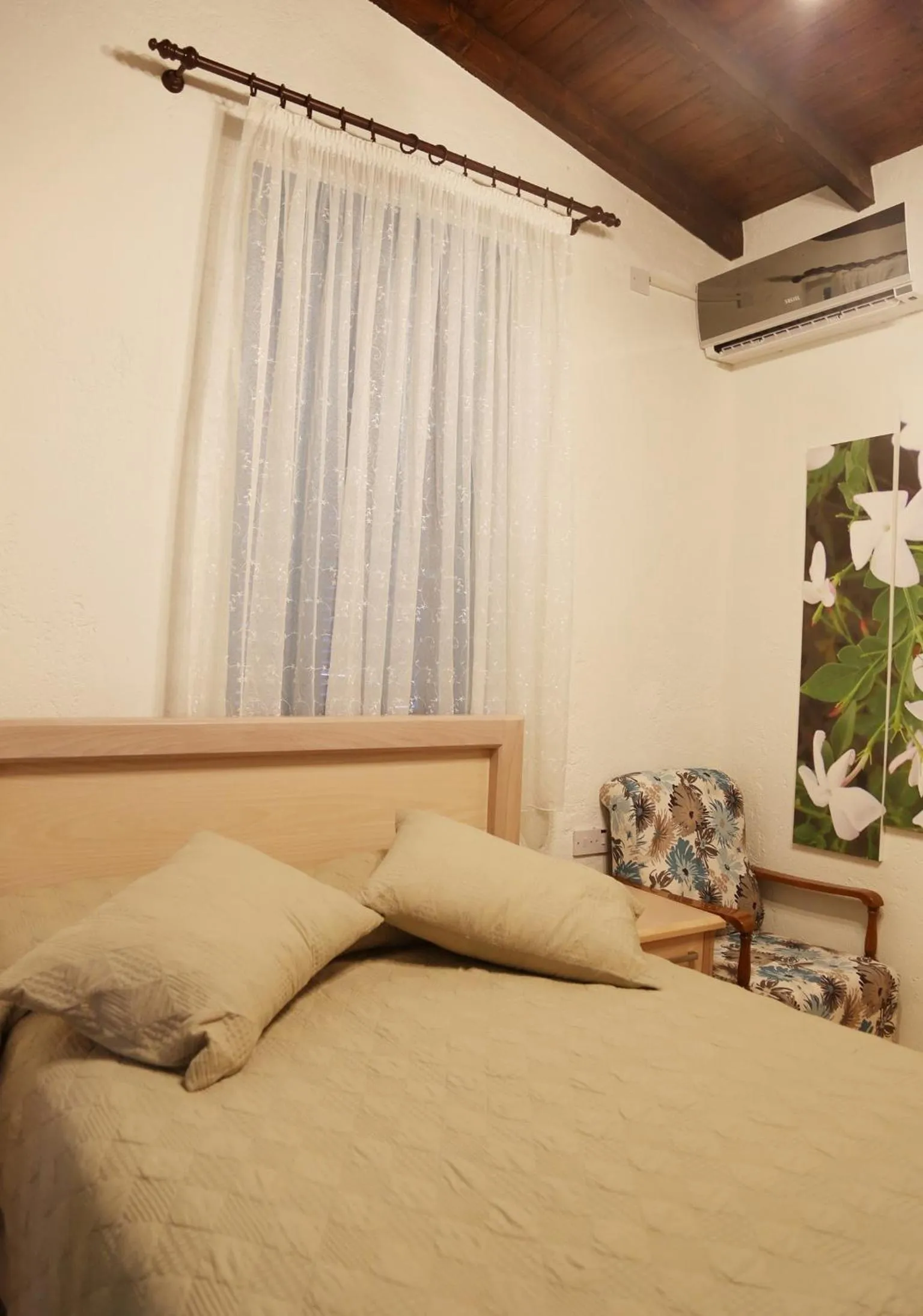 Decorative detail, Bed in Cypriot Swallow Boutique Hotel