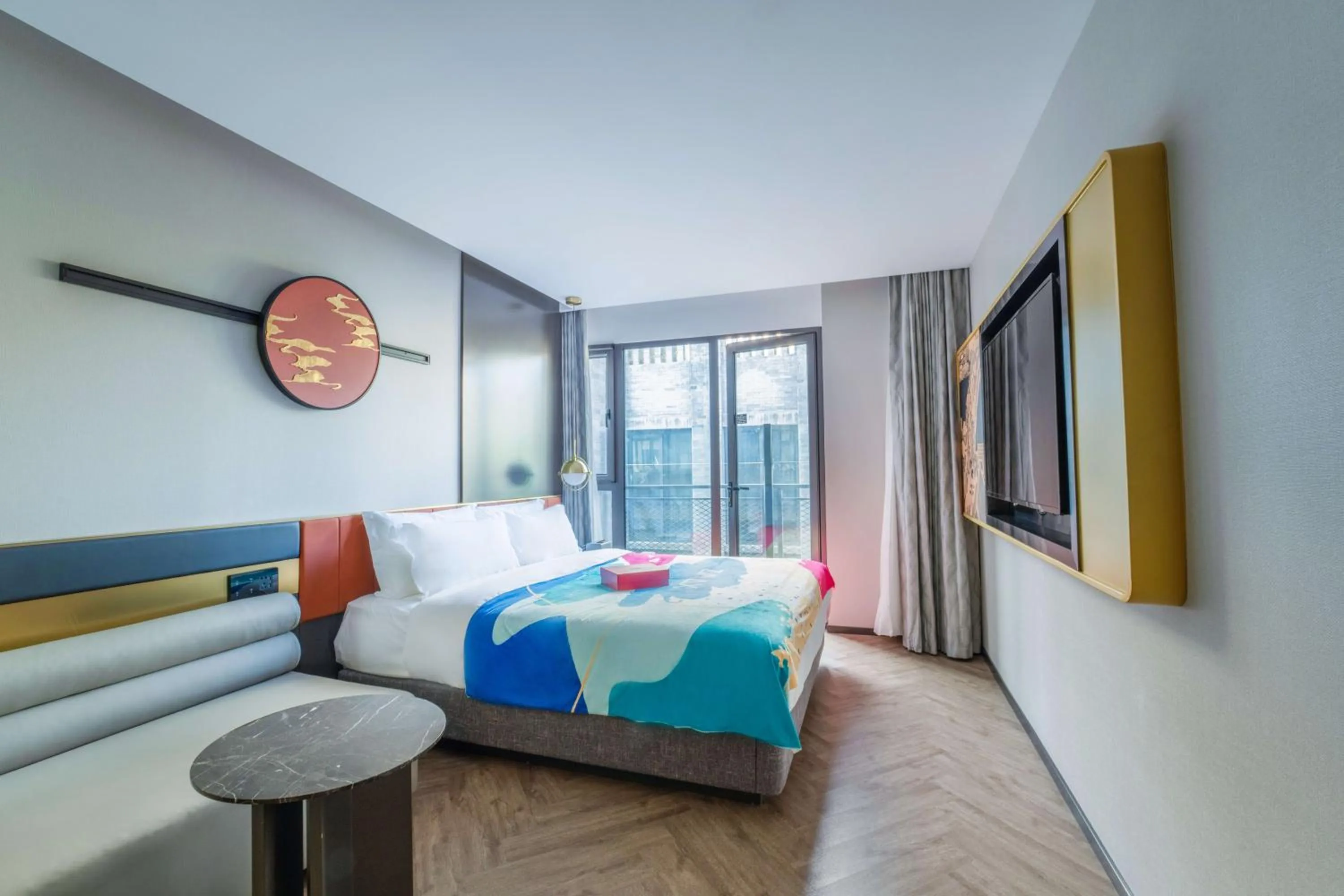 Bed in M Hotel - Beijing Tiananmen Square Qianmen Subway Station