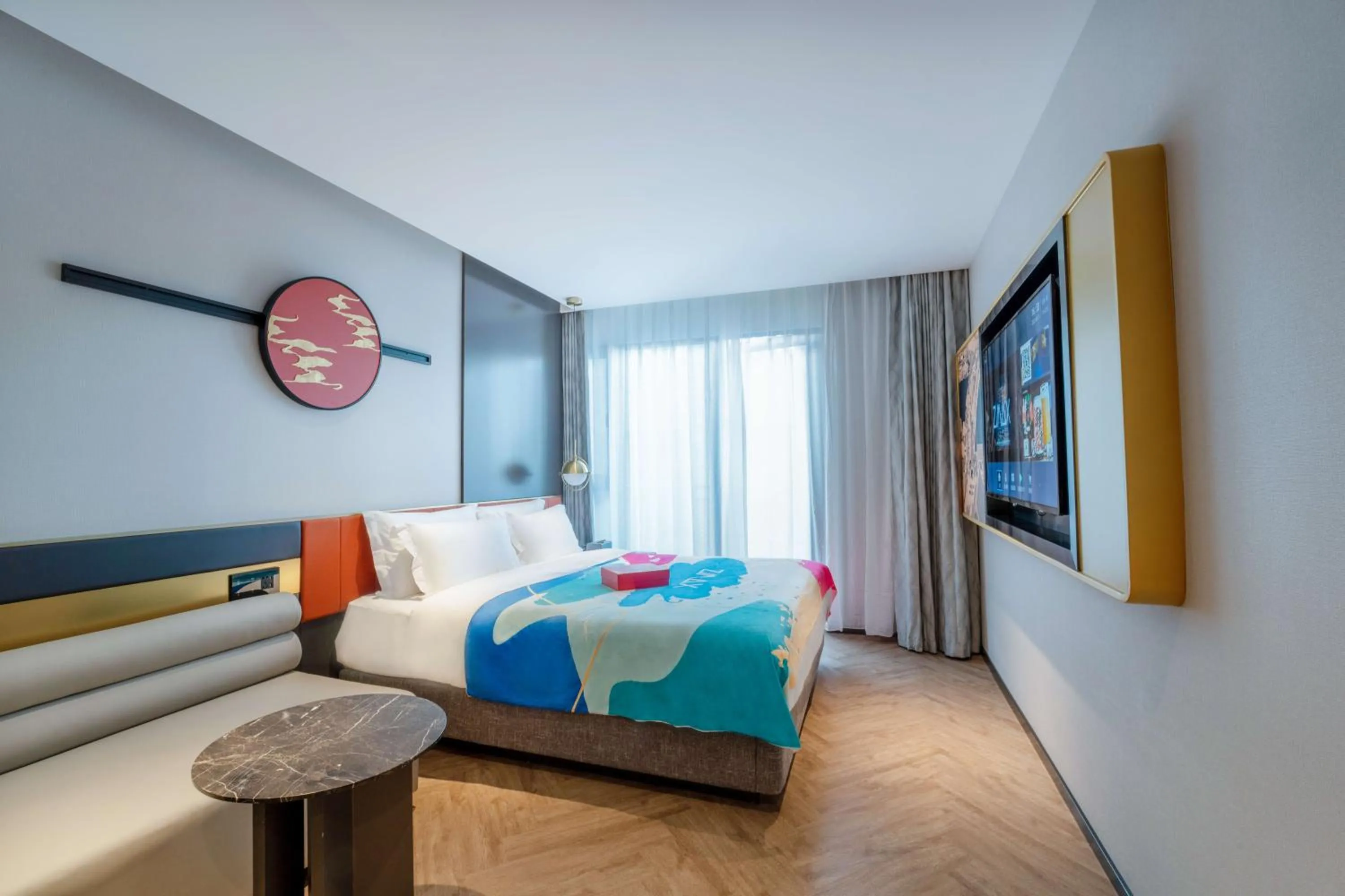 Bed in M Hotel - Beijing Tiananmen Square Qianmen Subway Station