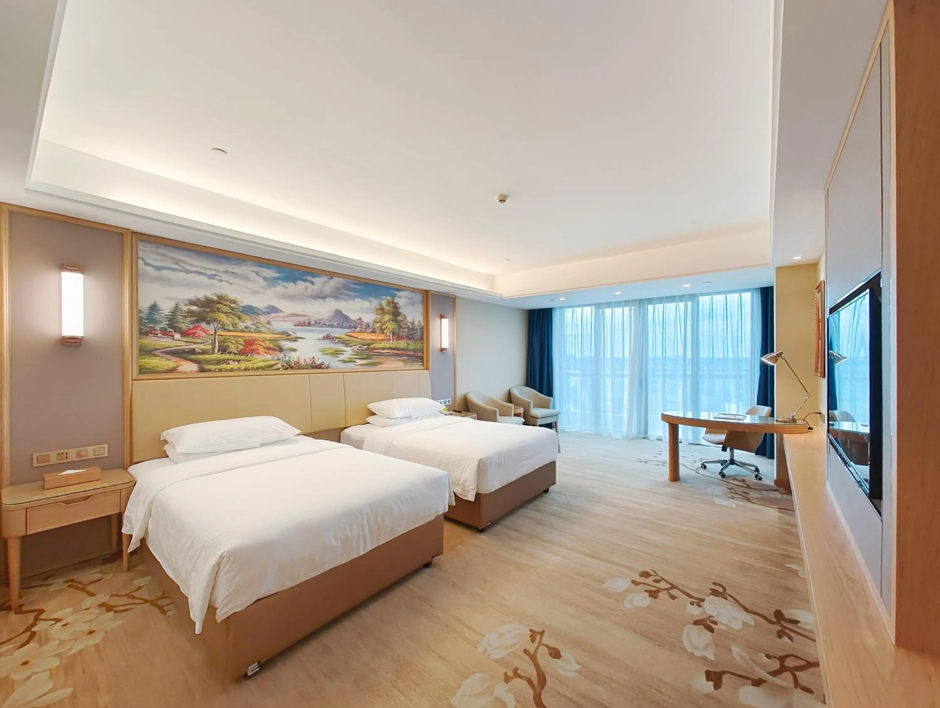 Bed in Vienna International Hotel Wenchang
