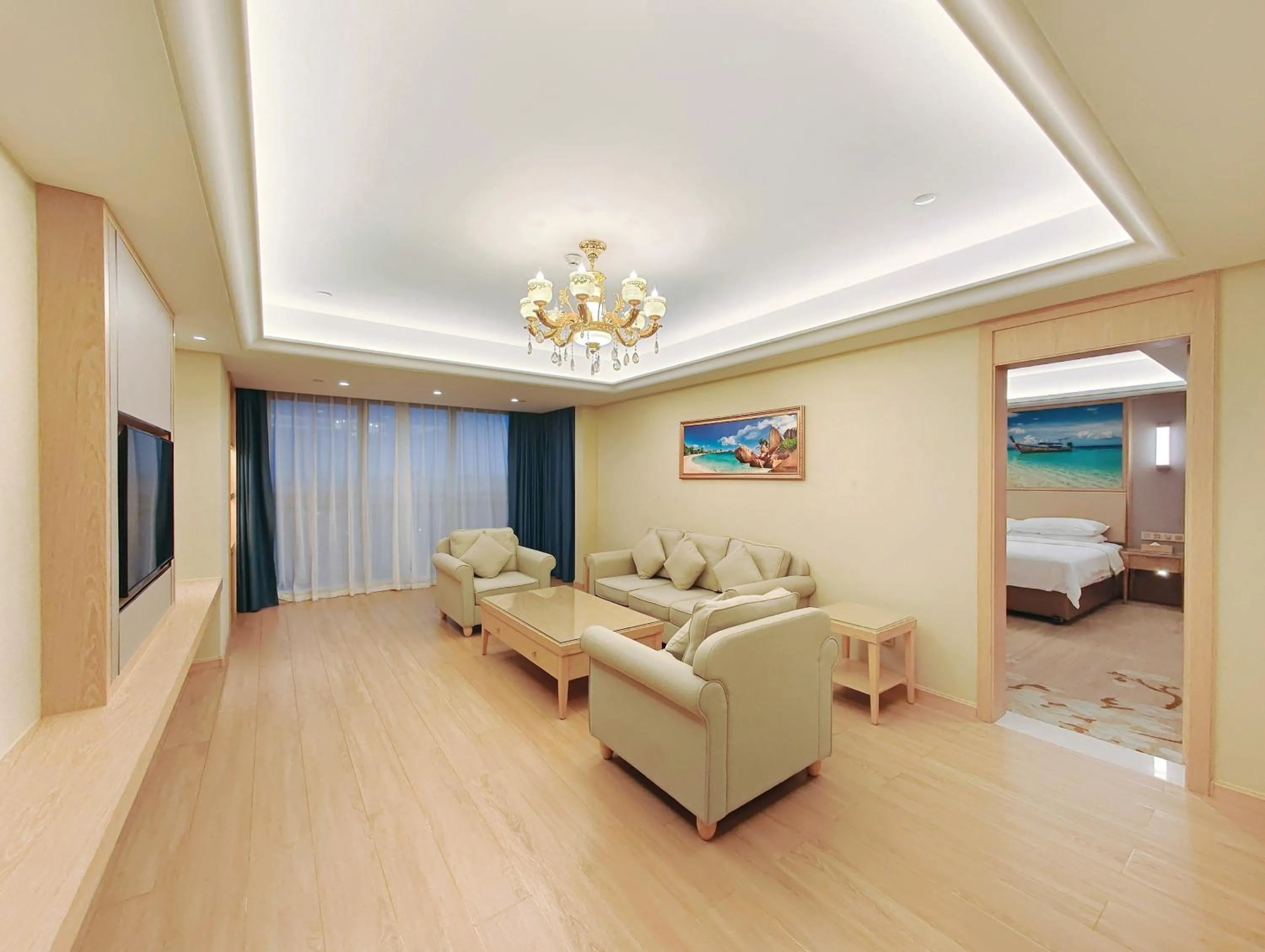 Living room, Bed in Vienna International Hotel Wenchang