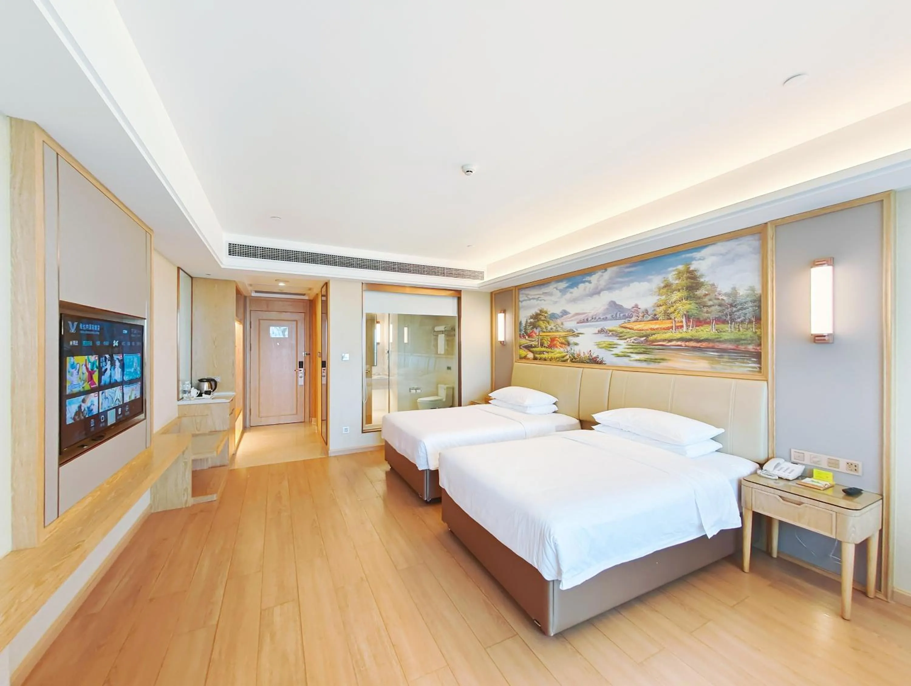 Bed in Vienna International Hotel Wenchang