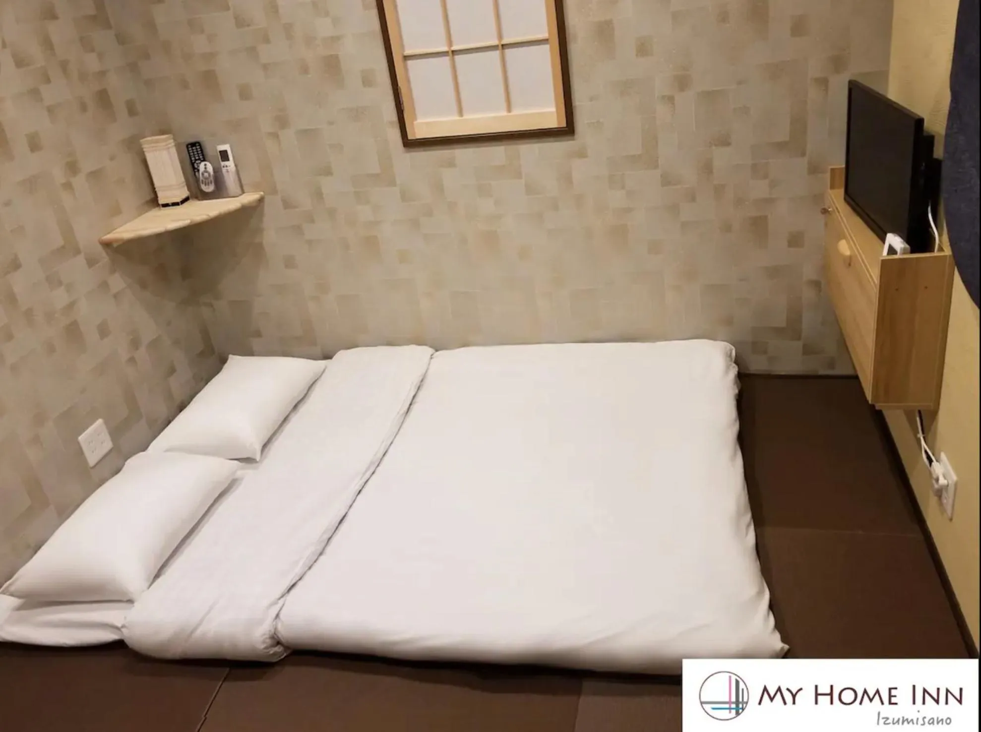 Bed in My Home Inn Izumisano