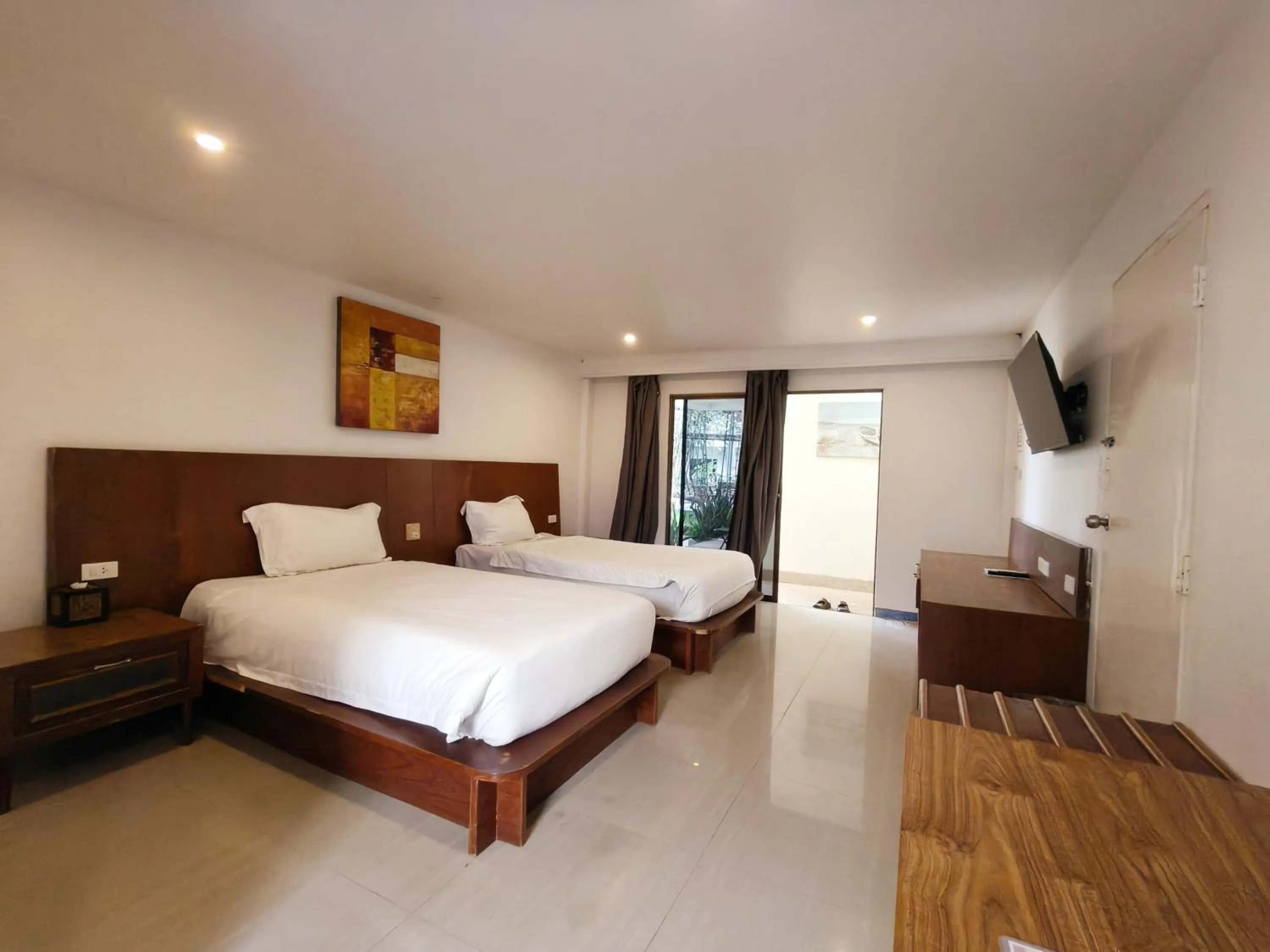 Bed in V Beach Resort