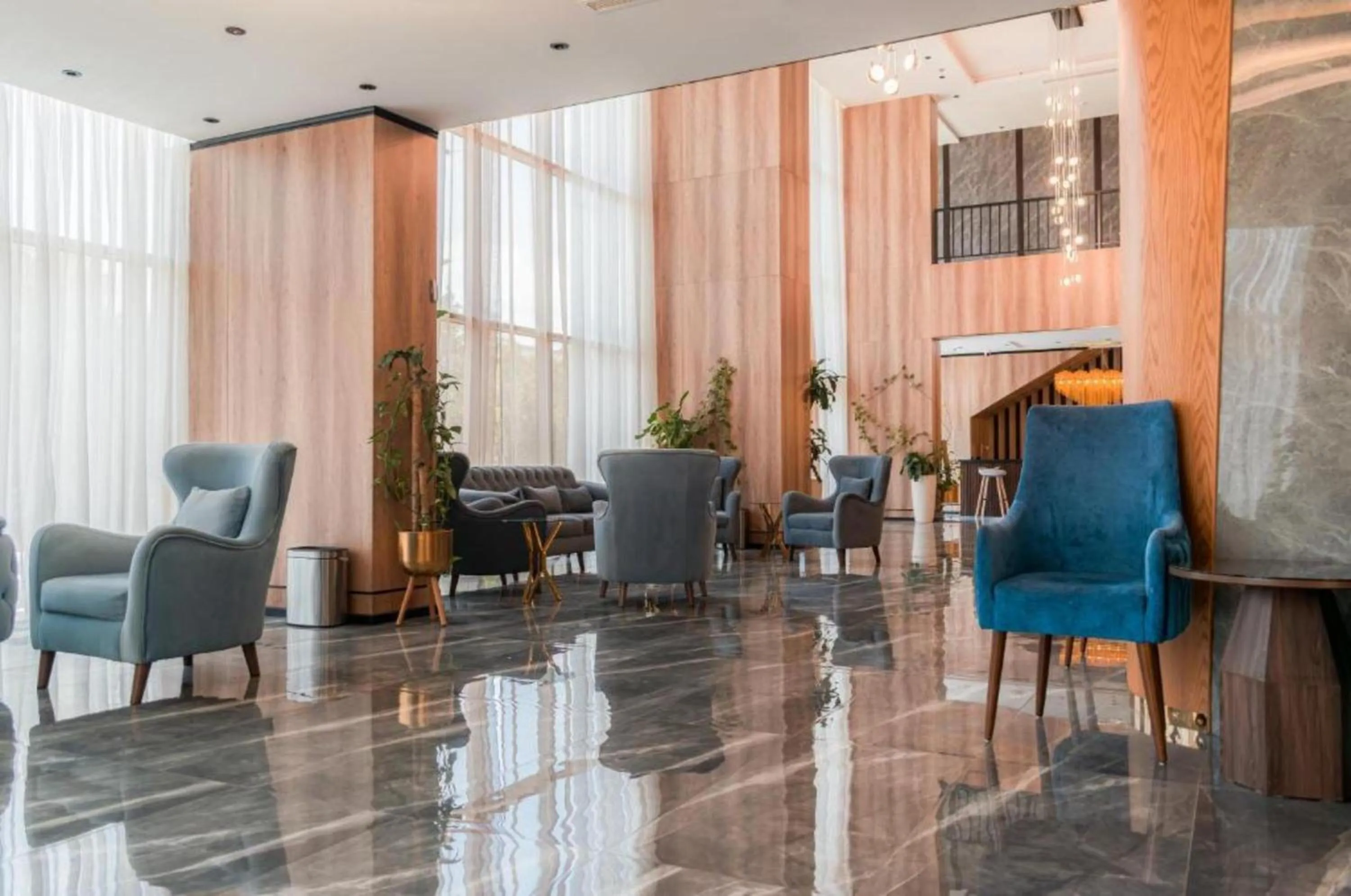 Living room in Palette Luxury MAS Hotel