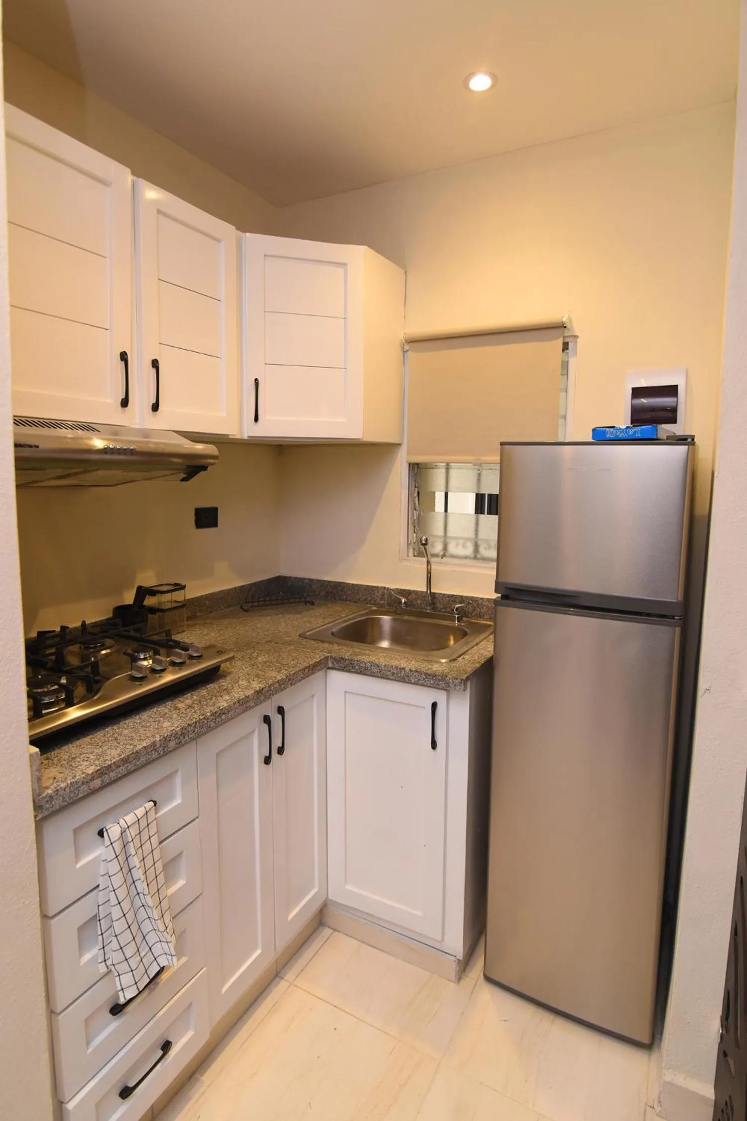 Kitchen or kitchenette in Solmi Rooms