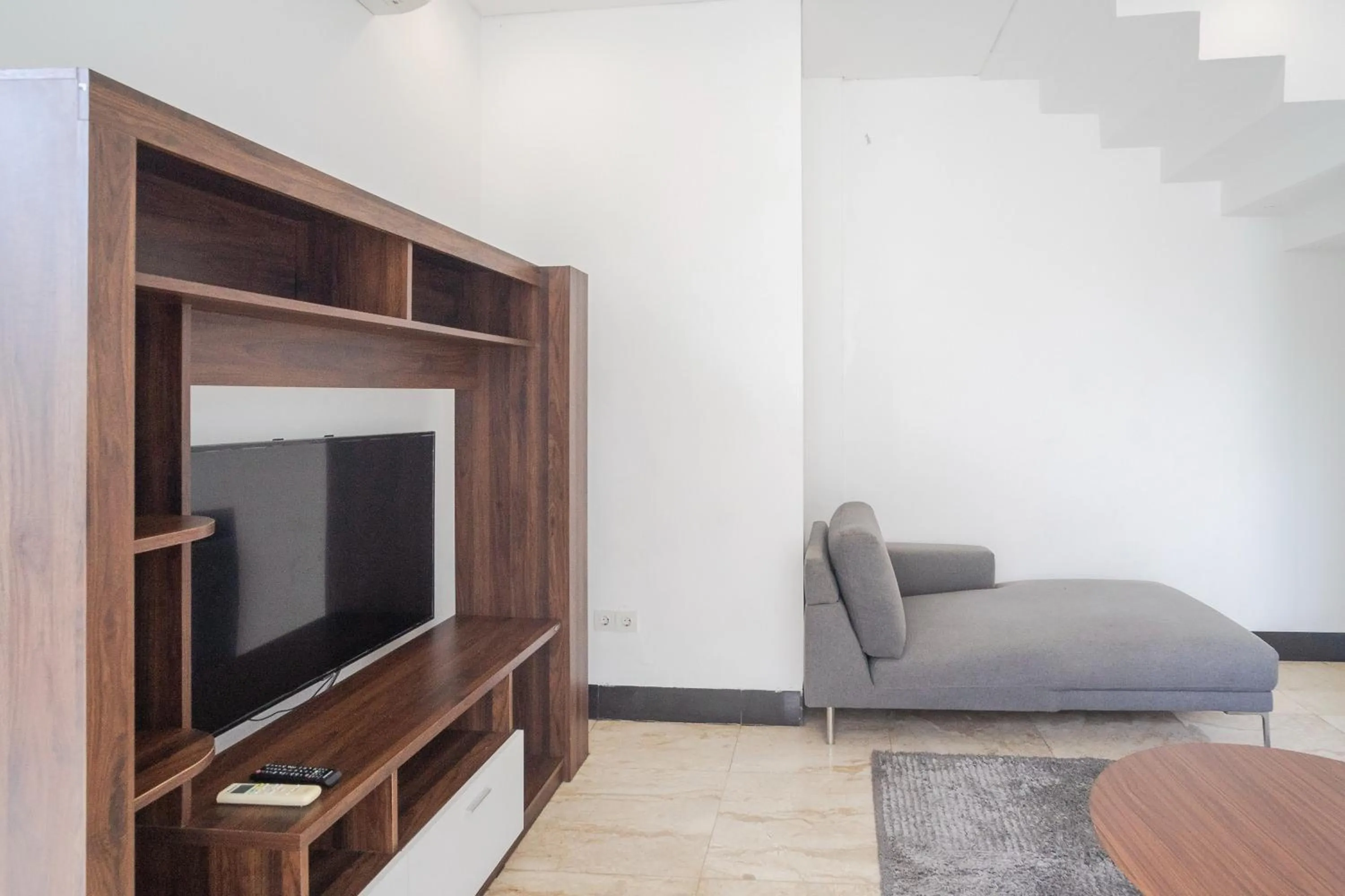 Communal lounge/ TV room in Villa Blue Margarita Canggu