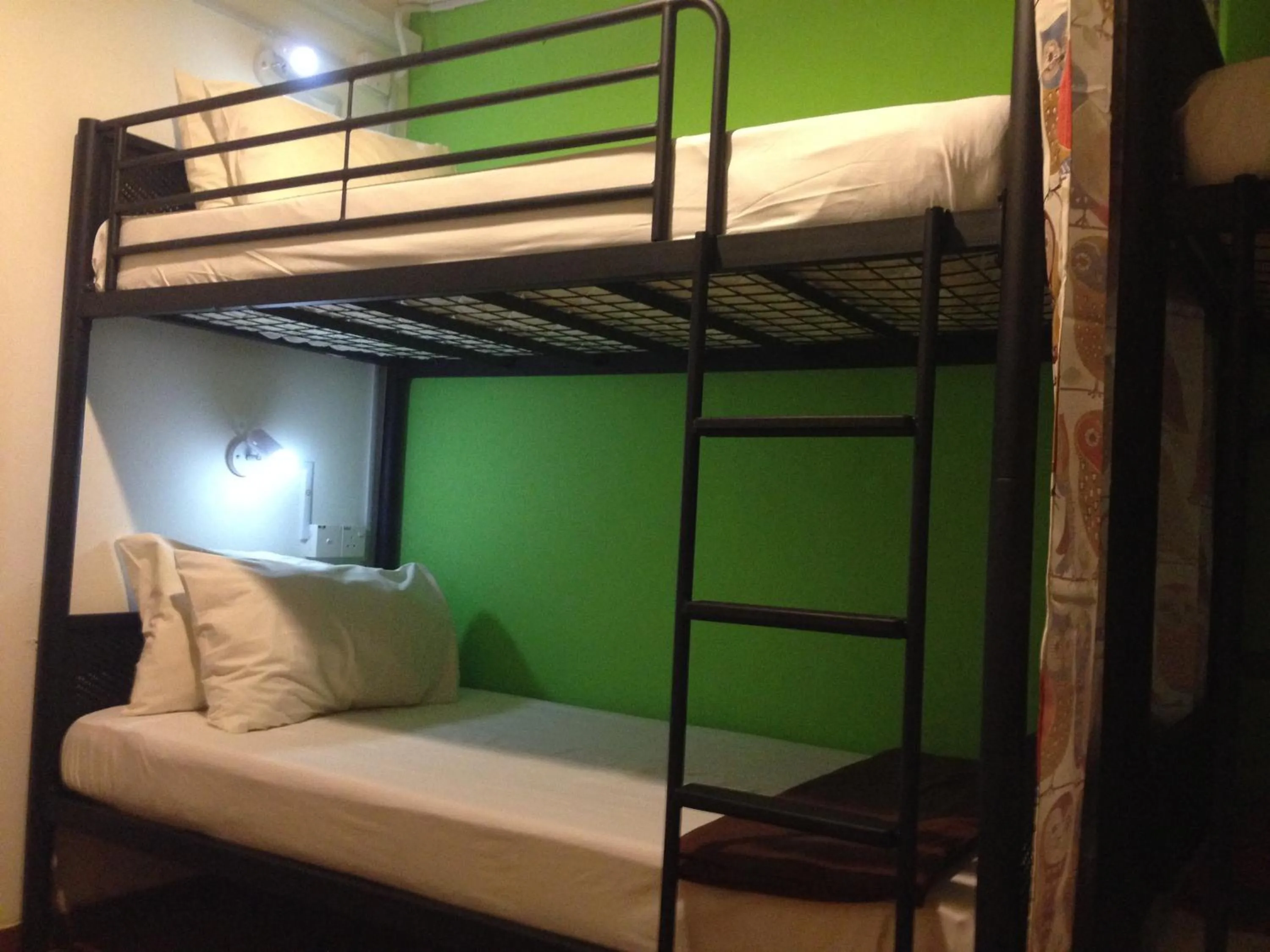 Decorative detail, Bed in Woodpecker Lodge, Kuching