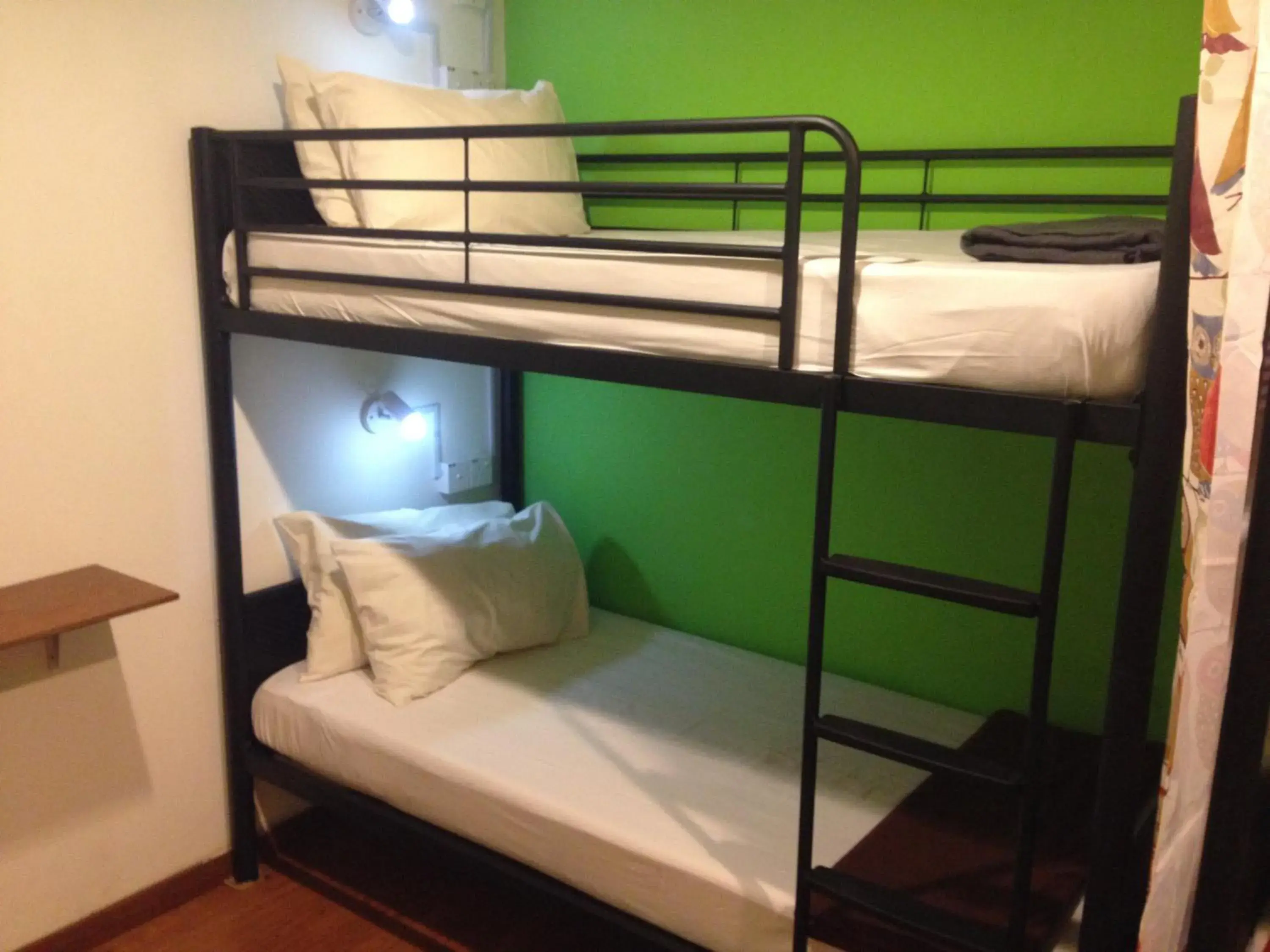 Bed in 4-Bed Dormitory Room in Woodpecker Lodge, Kuching Bed in 4-Bed Dormitory Room in Woodpecker Lodge, Kuching