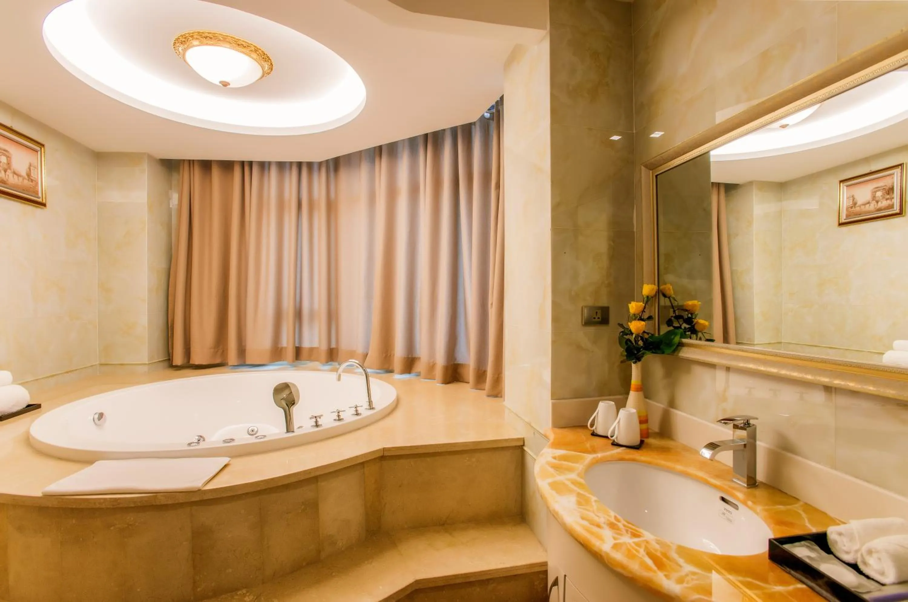 Shower, Bed in Muong Thanh Grand Bac Giang Hotel