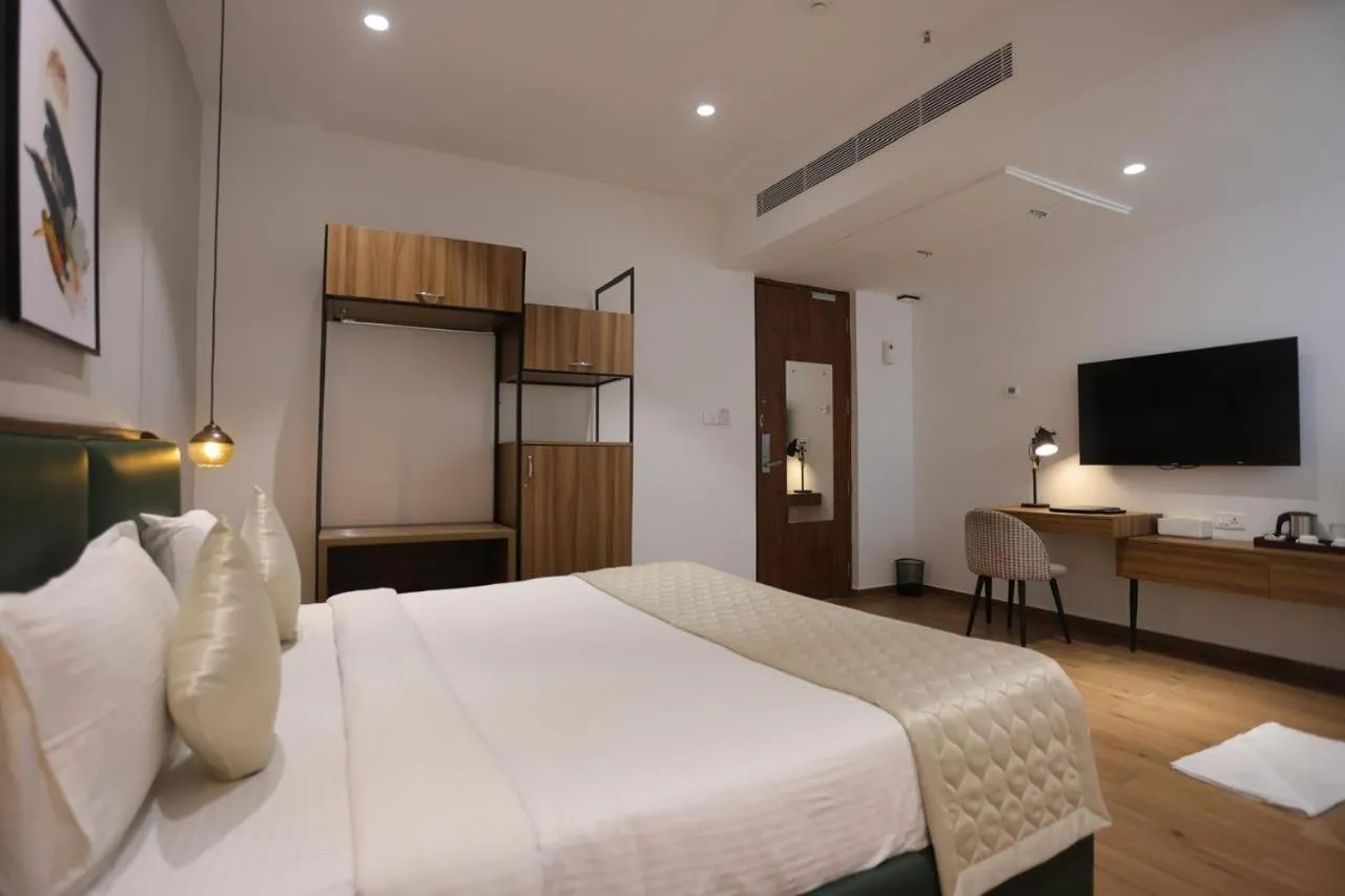 TV and multimedia, Bed in Pondy Heights - Suites and Studios