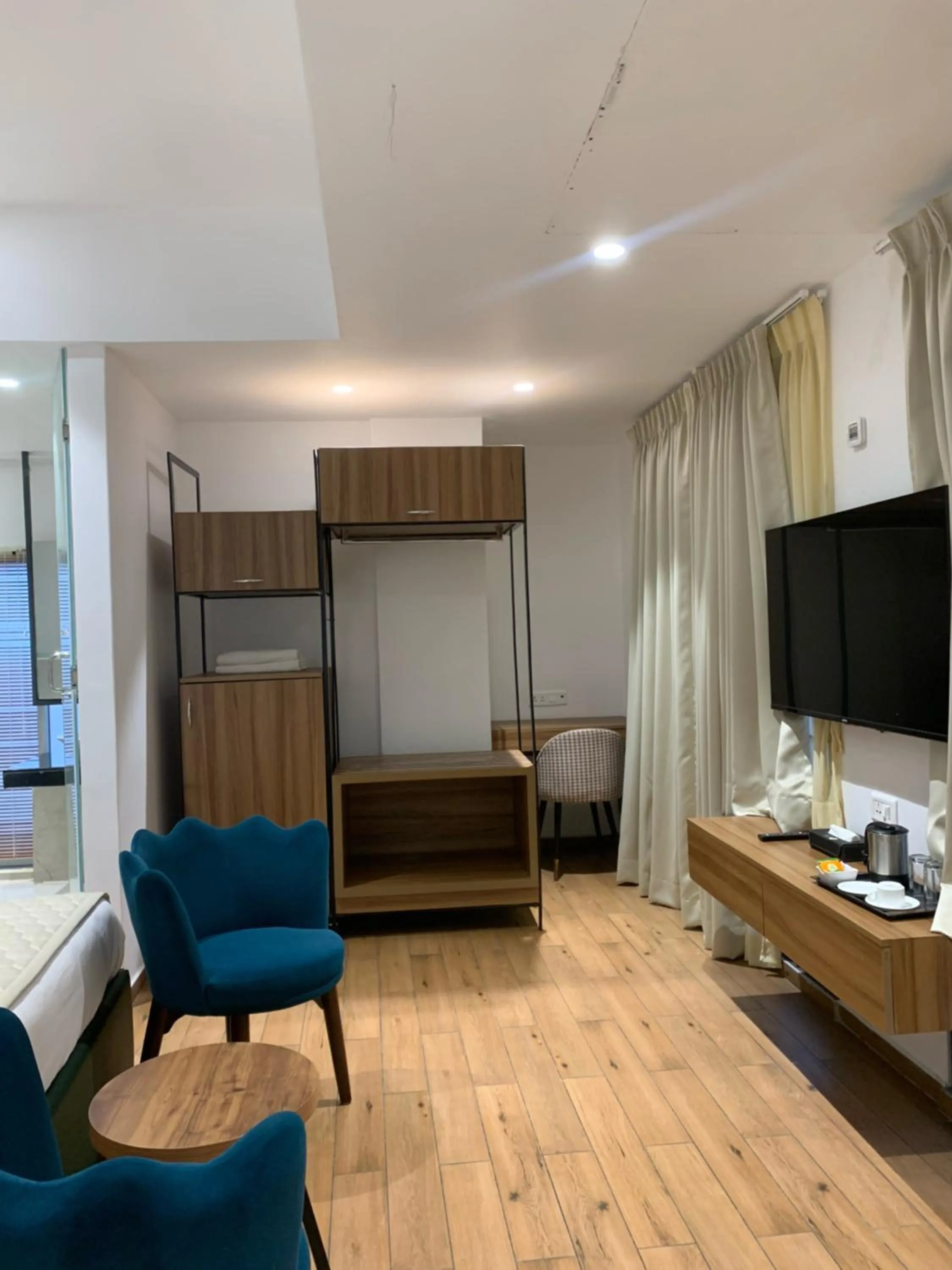 Photo of the whole room, Bed in Pondy Heights - Suites and Studios