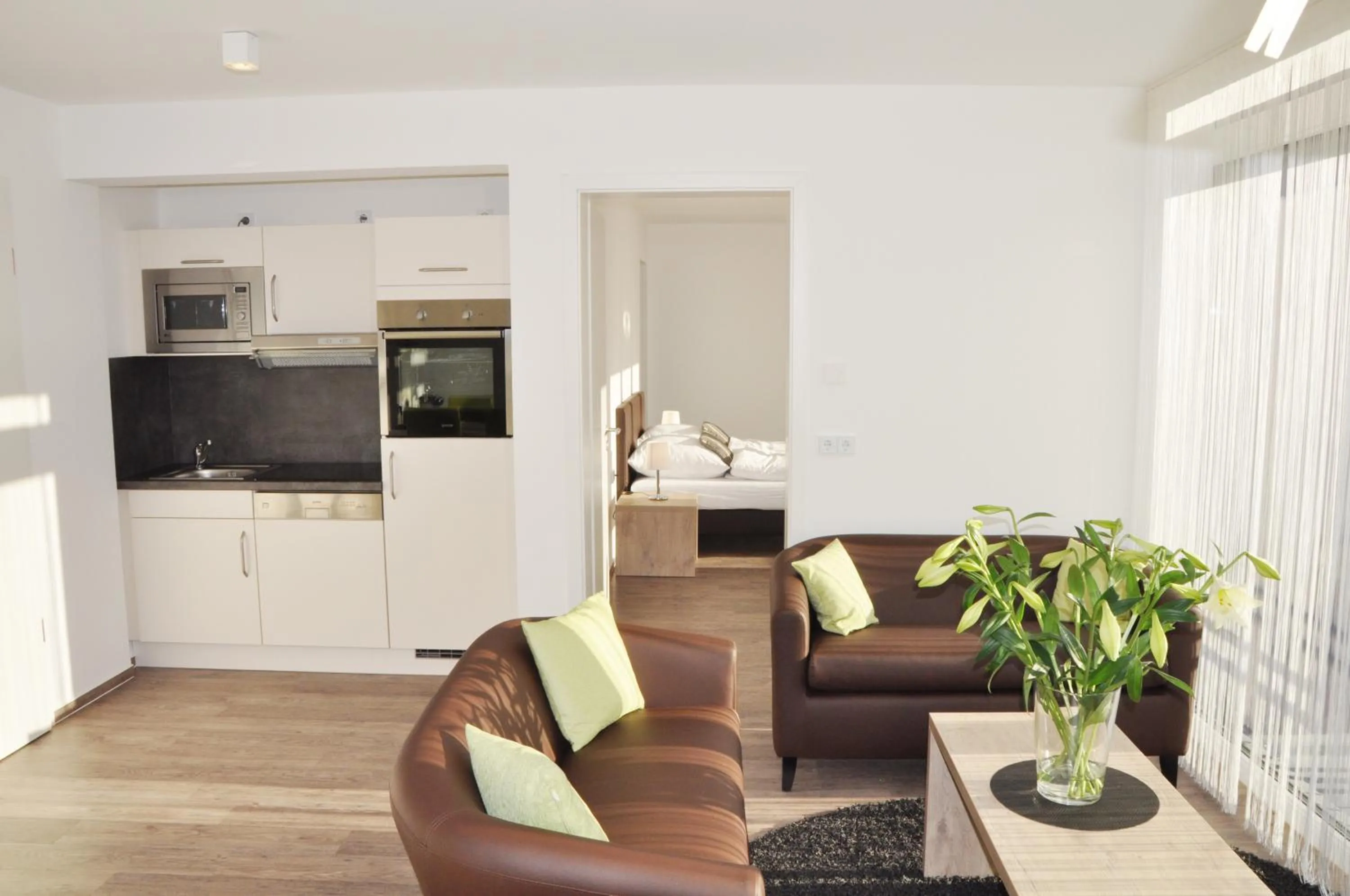 Kitchen or kitchenette in ADAPT APARTMENT HOTEL BERLIN - Adlershof