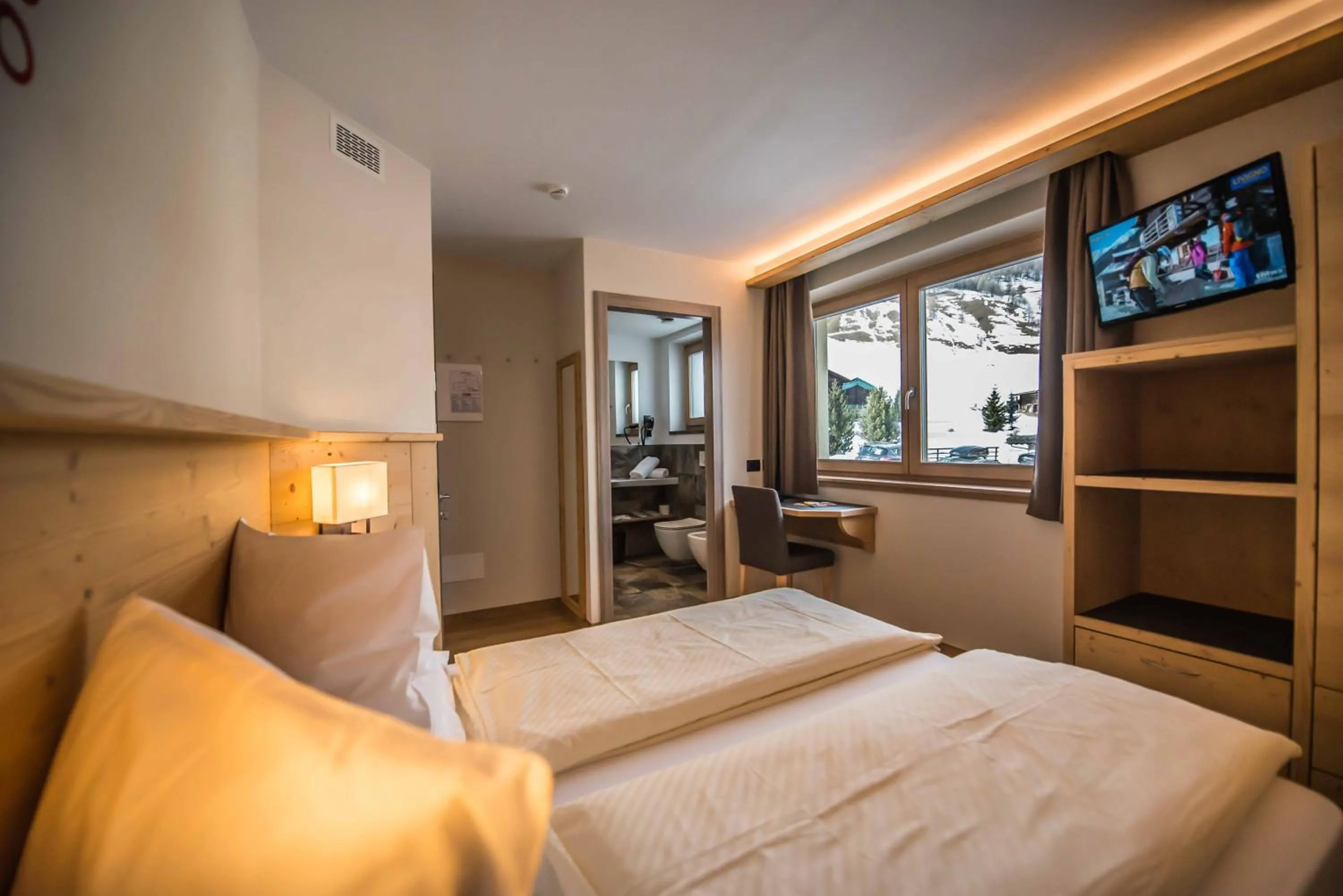 Bed in Hotel Le Alpi