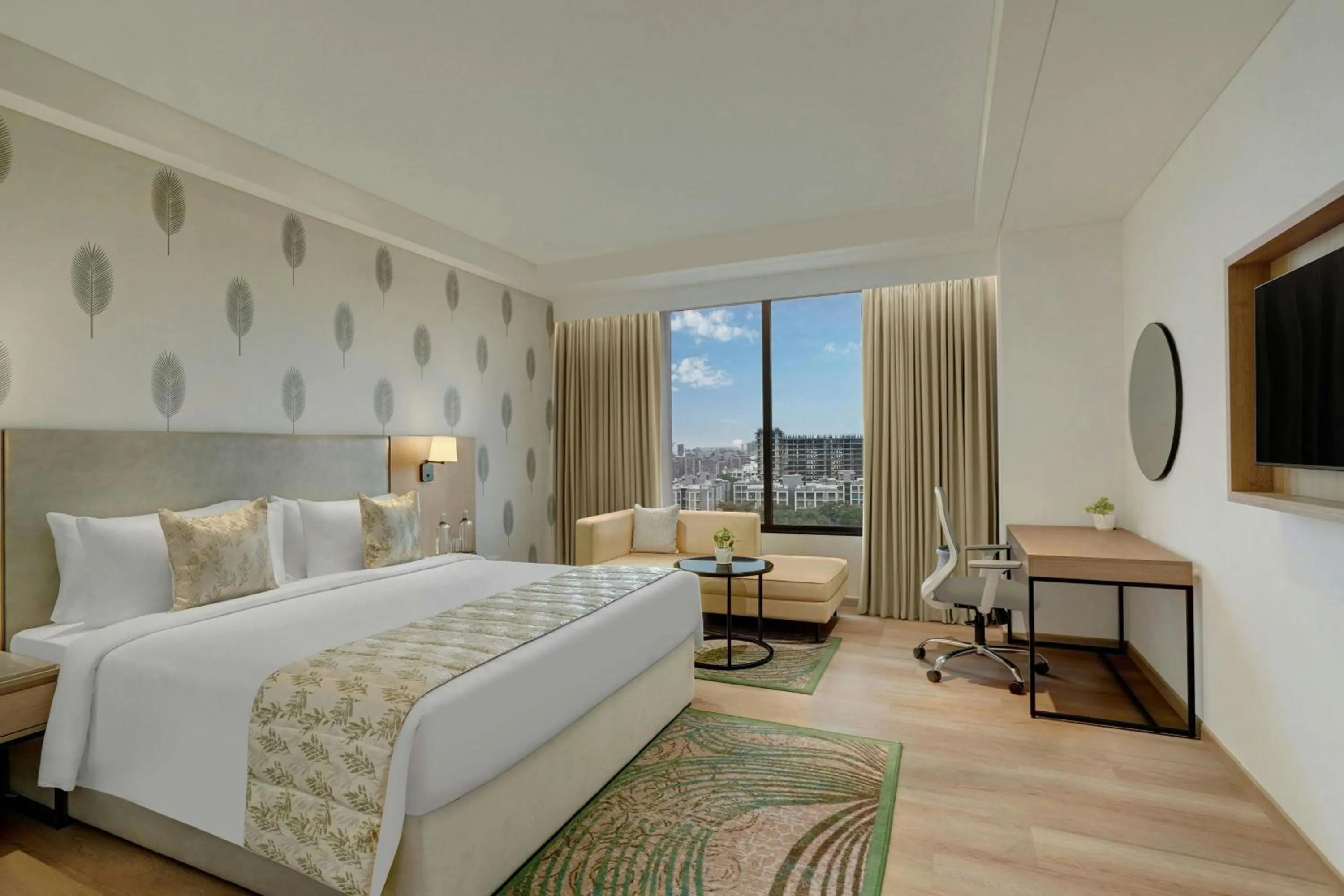 Photo of the whole room, Bed in The Fern Residency, Gandhinagar, Series by Marriott