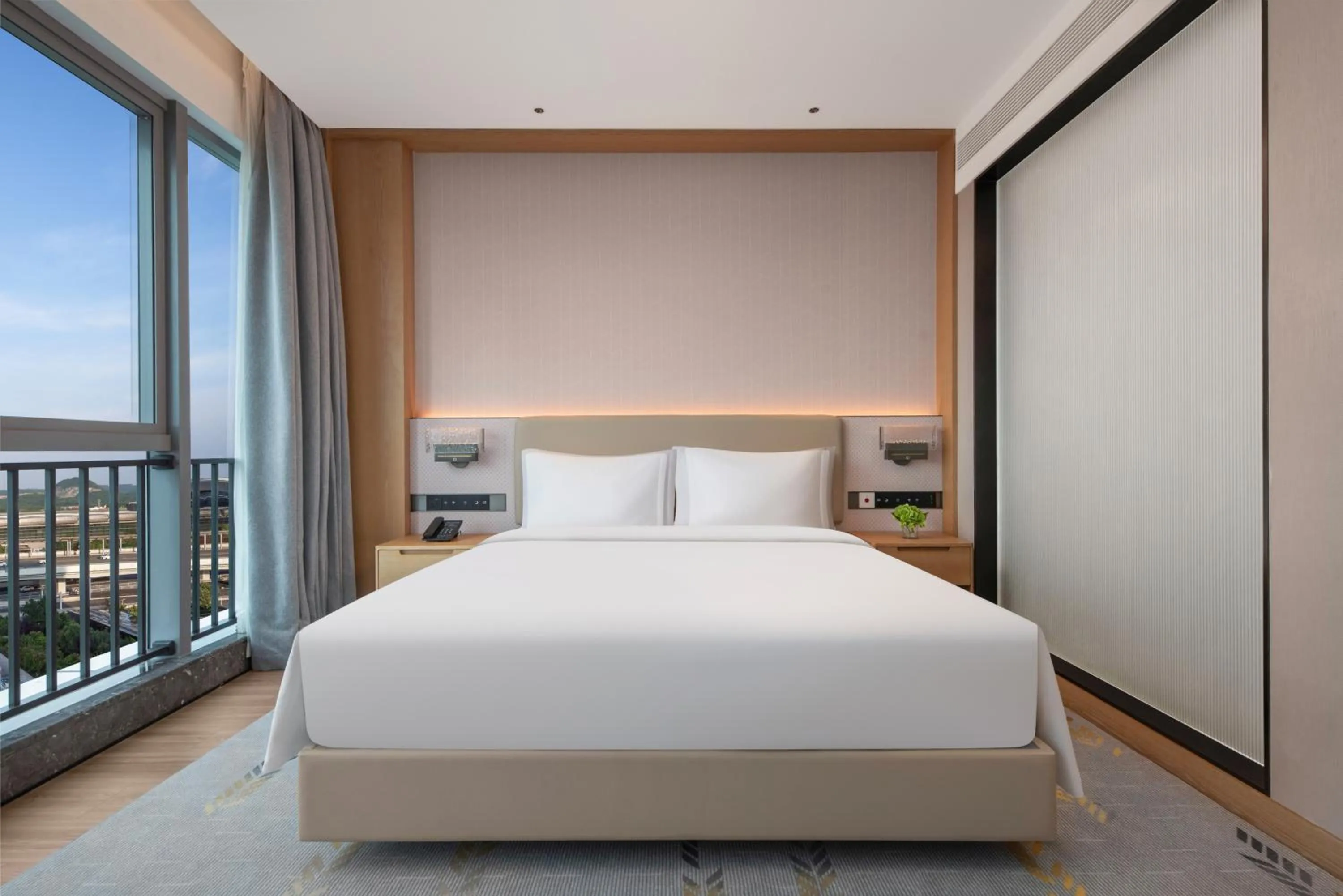 Photo of the whole room, Bed in Holiday Inn Guiyang Airport by IHG
