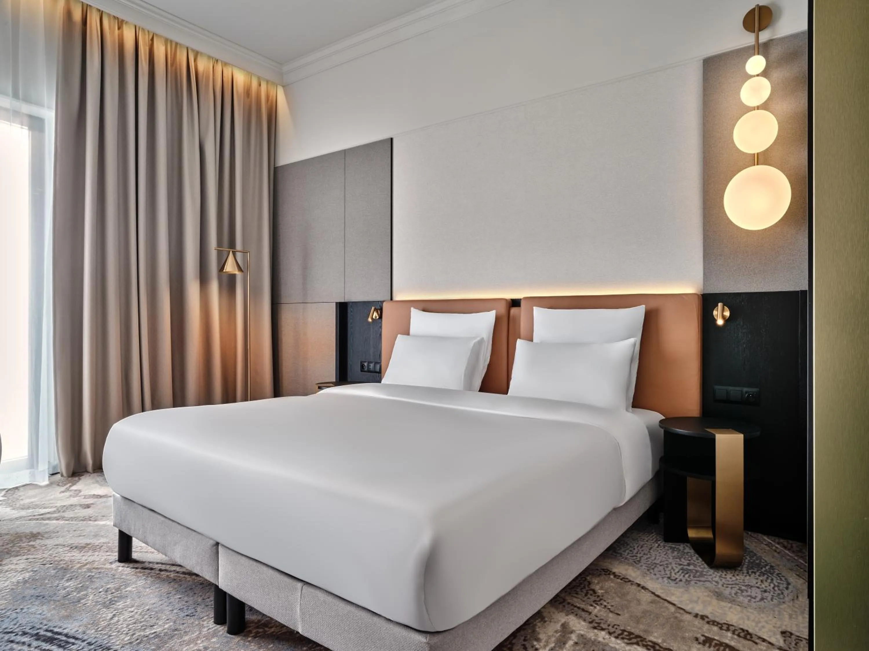 Bed in Mövenpick Grand Hotel Wroclaw