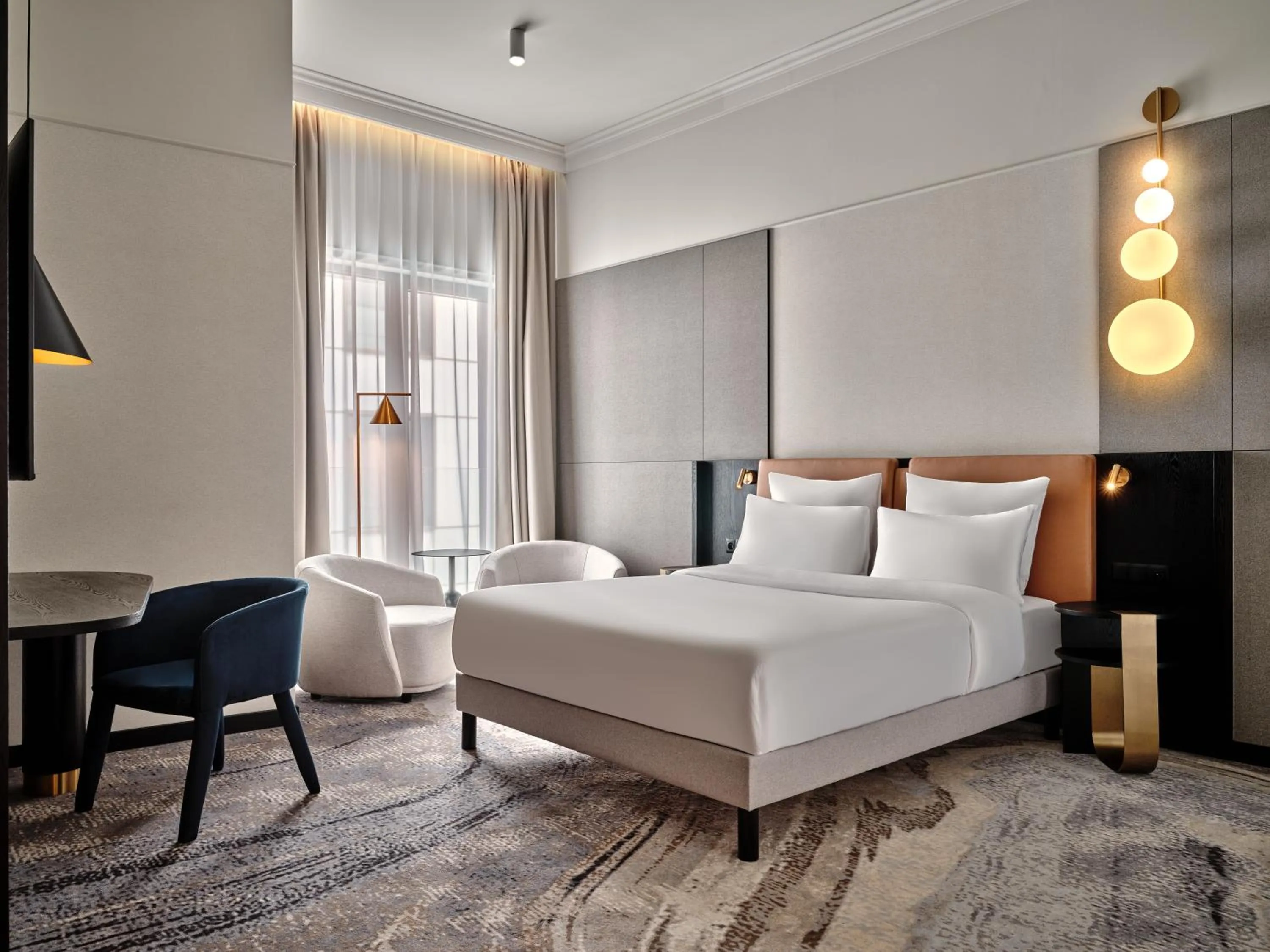 Bed in Mövenpick Grand Hotel Wroclaw