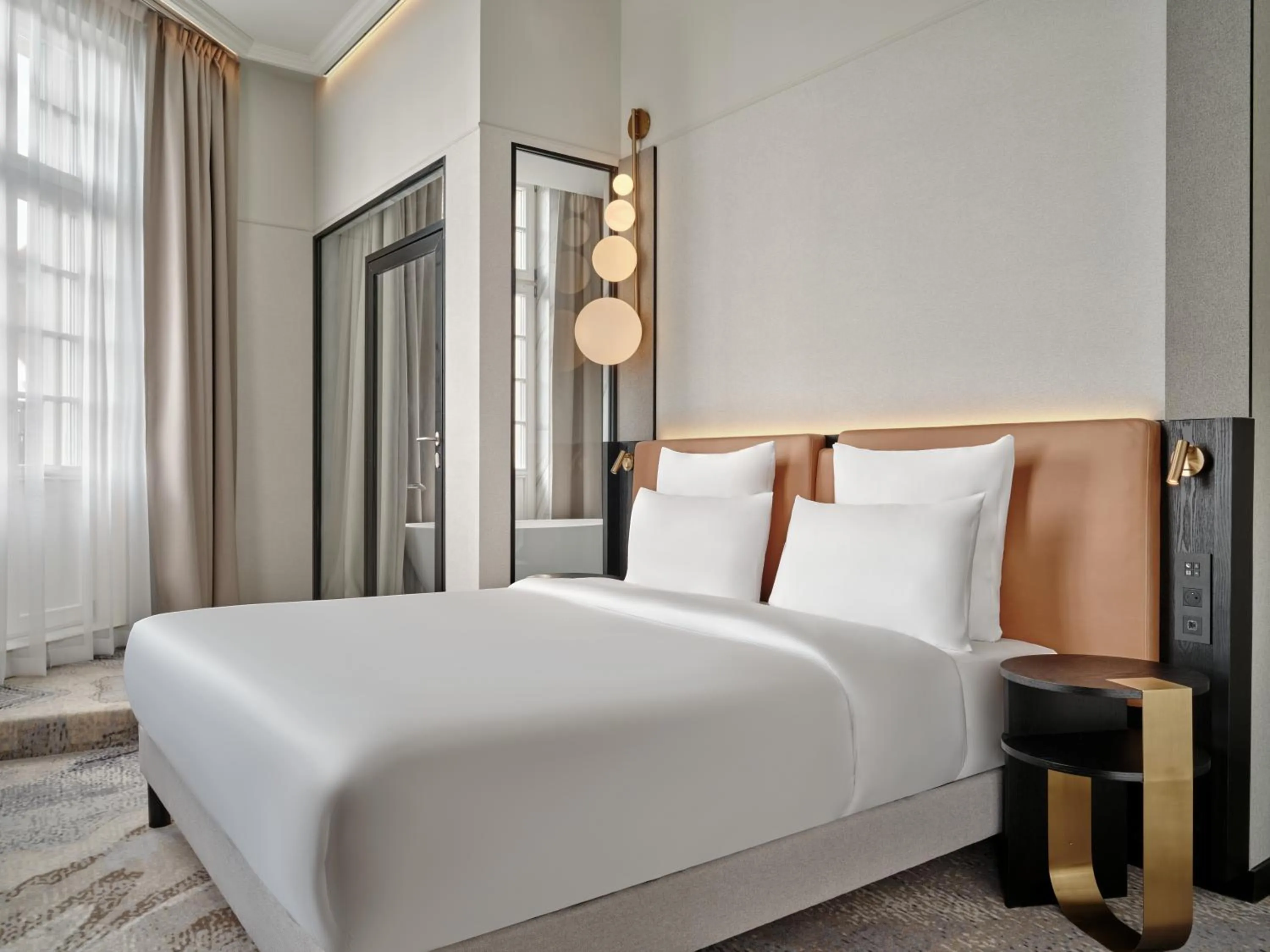 Bed in Mövenpick Grand Hotel Wroclaw