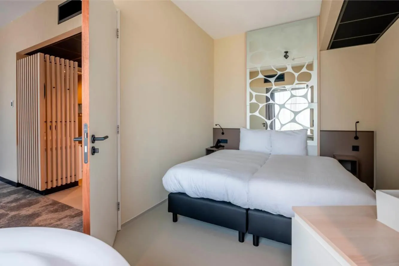 Bed in Waterstate Wellness hotel Goes