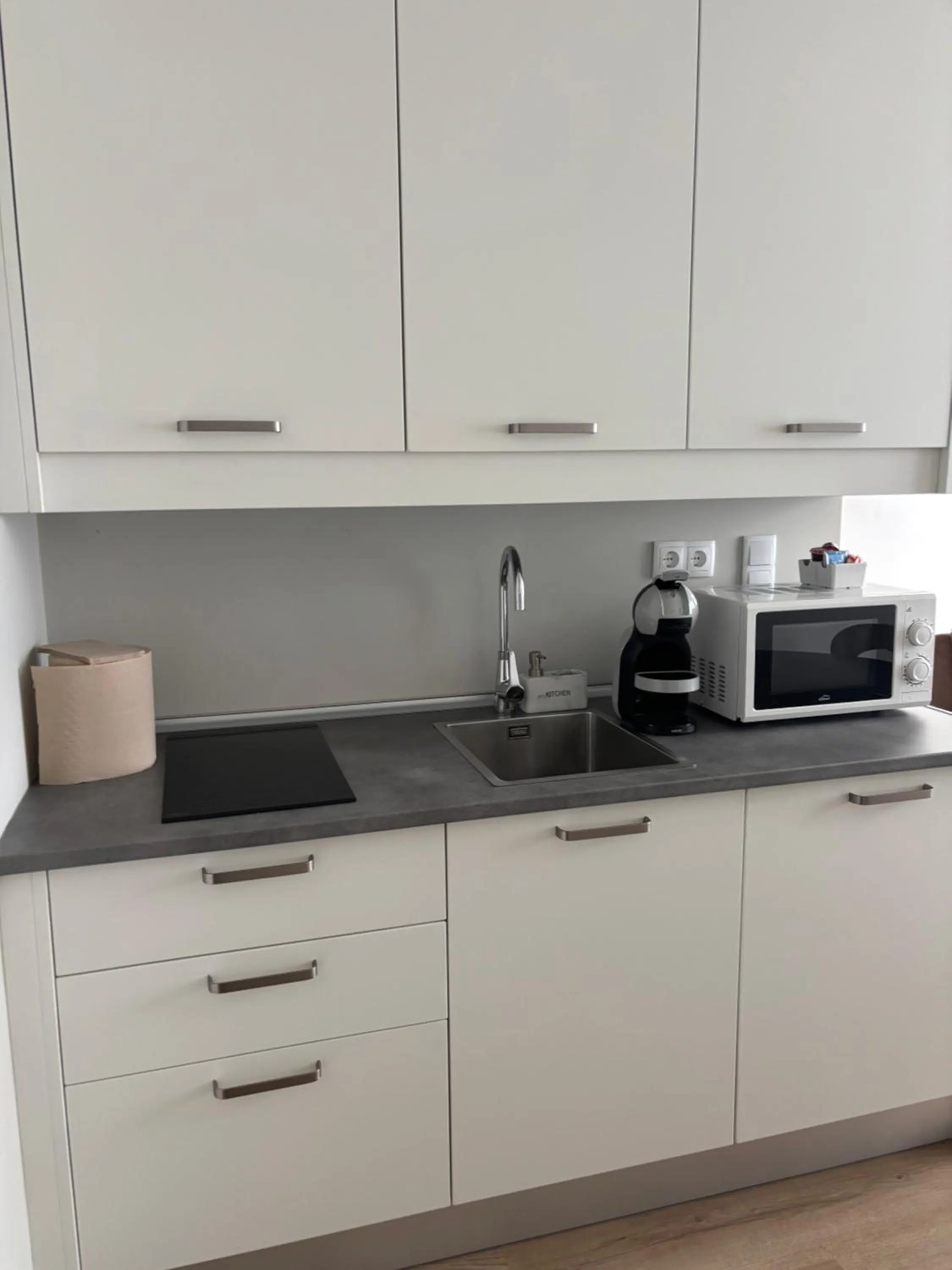 Kitchen or kitchenette in Azores Book Hotel