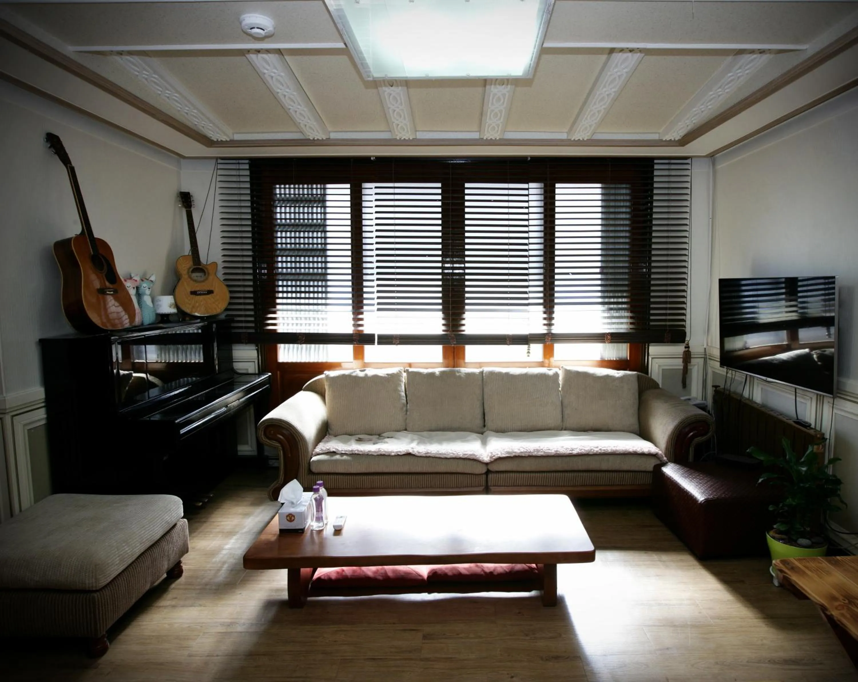 Communal lounge/ TV room in Green Guesthouse