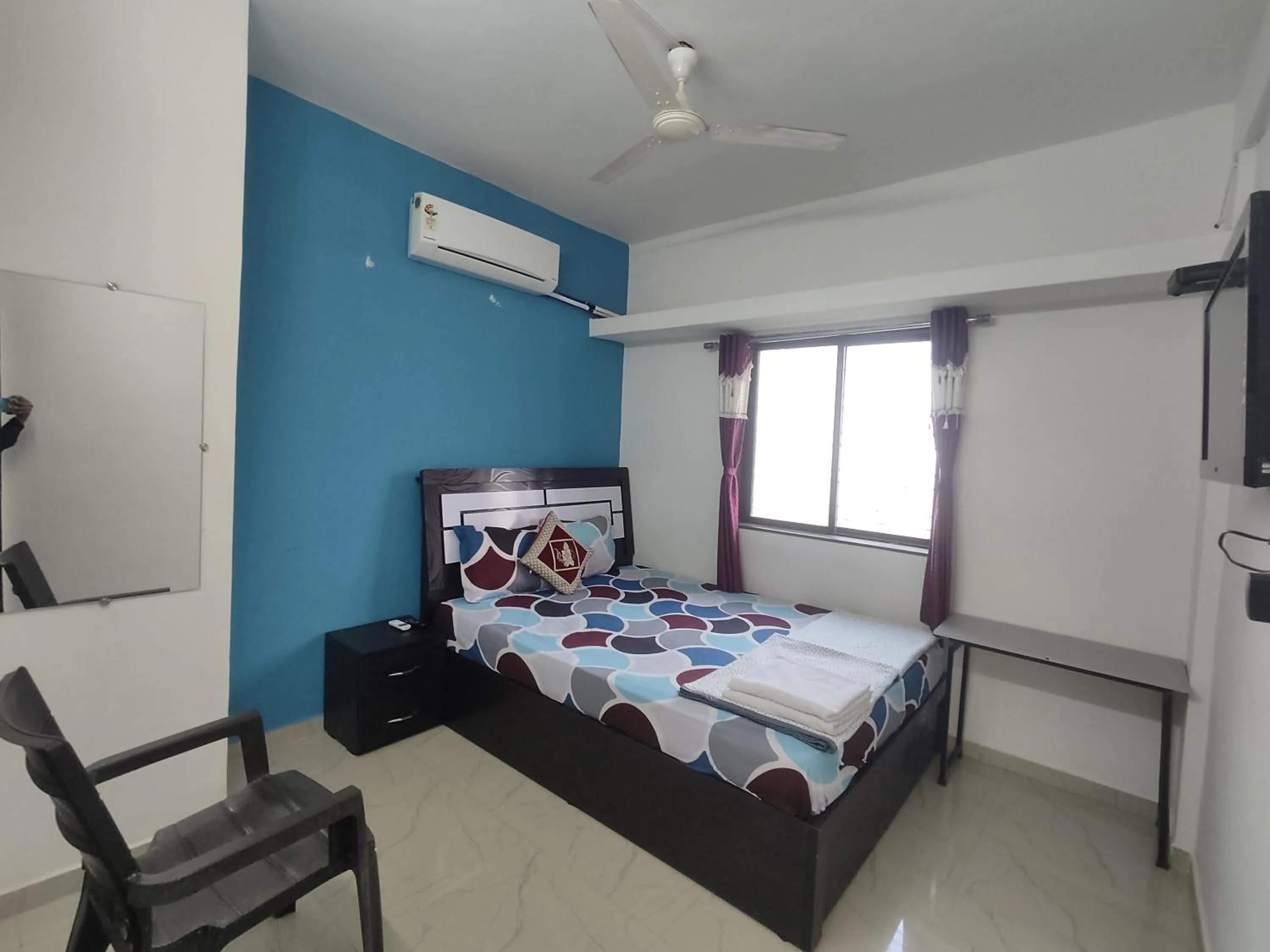 Bed in Ambient Homestay by NESTEASY