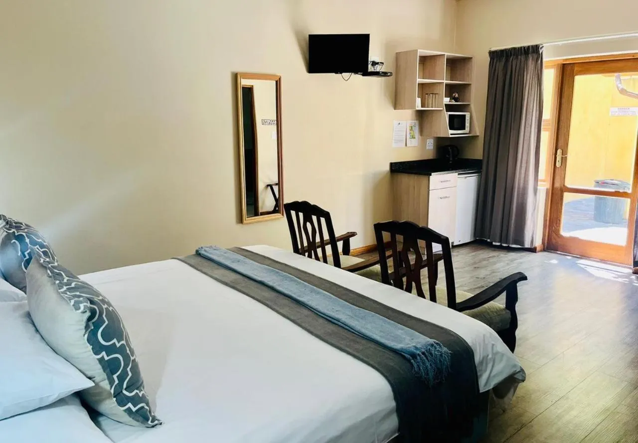 Bed in 17 on Bird Guest House