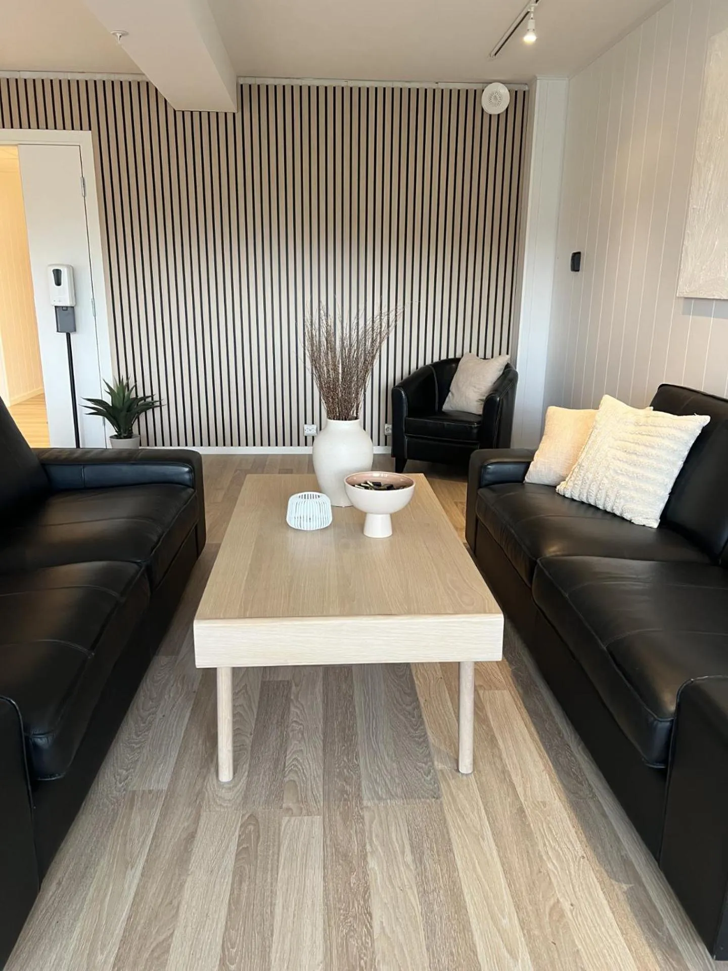 Communal lounge/ TV room in Selvbetjent leilighetshotell på Ålgård