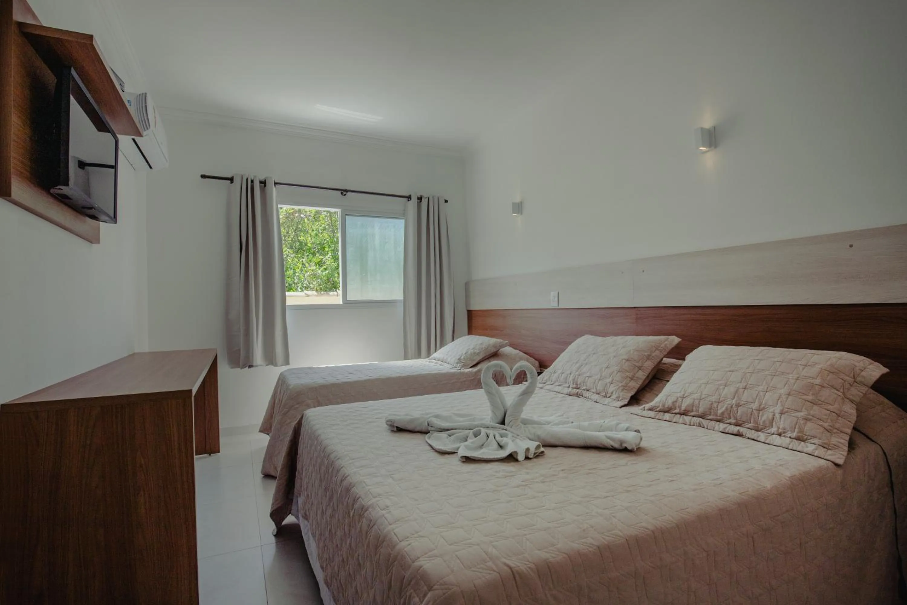 Bed in Pousada Recanto Jota Ge