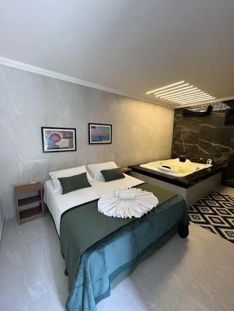 Bed in Pousada Recanto Jota Ge