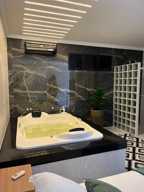 Bed in Pousada Recanto Jota Ge